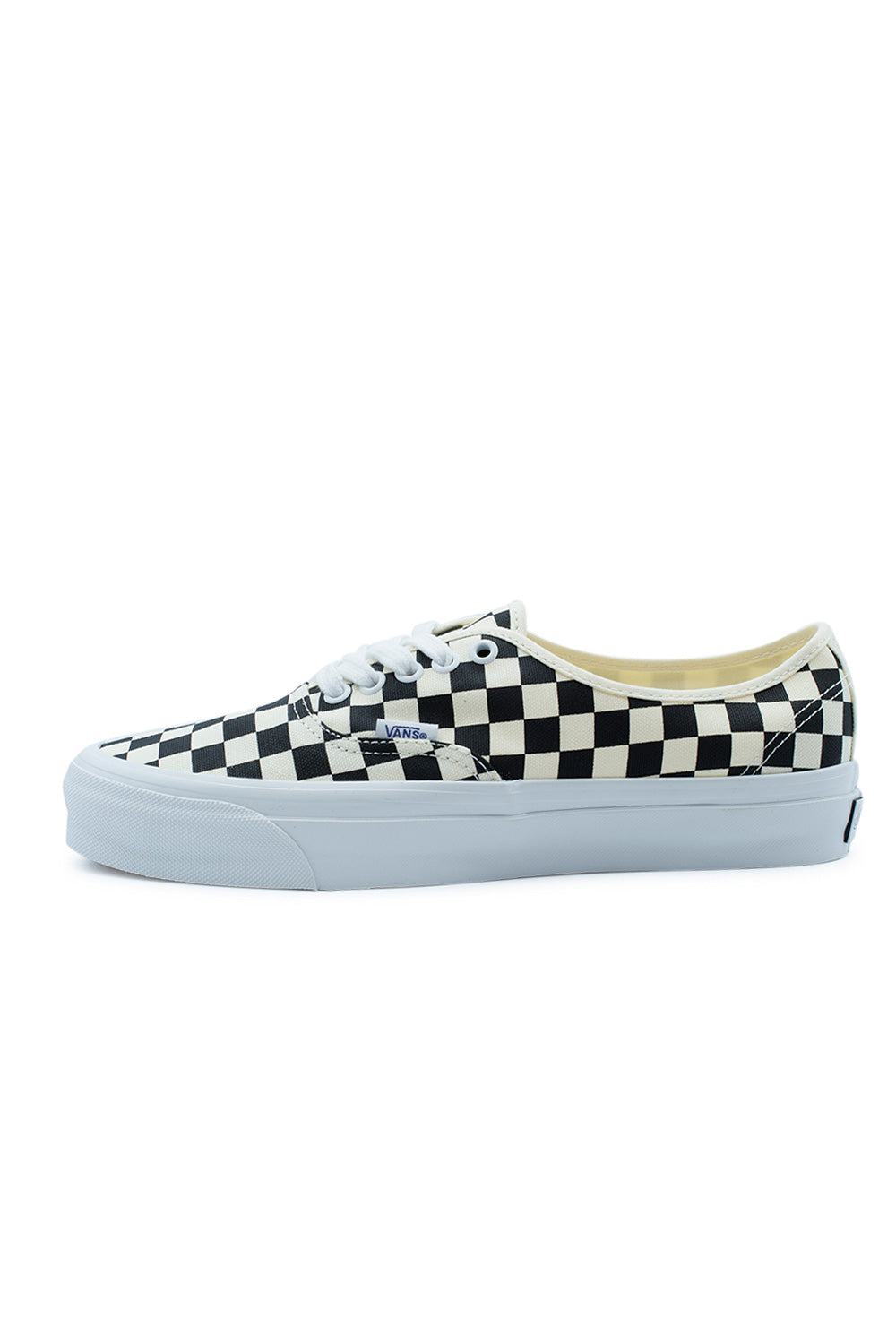Side profile of the Vans LX Authentic Reissue 44 Shoe Checkerboard Black / Off White featuring the iconic screen-printed checkerboard 226g canvas upper, premium low-top silhouette, higher glossy foxing, archival Vans construction and classic skateboarding heritage design.