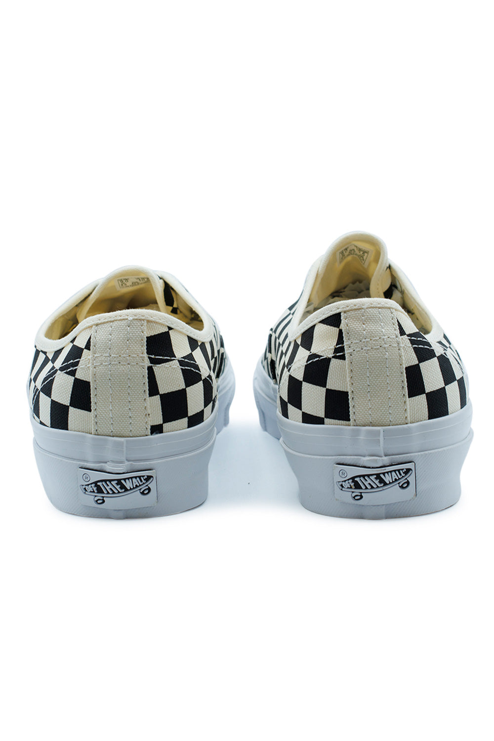 Rear view of the Vans LX Authentic Reissue 44 Checkerboard Black Off White highlighting vintage striped heel stitching, Off The Wall heel license plate, elevated glossy sidewall, archive-inspired construction and the unmistakable checkerboard skate shoe aesthetic first introduced by Vans.