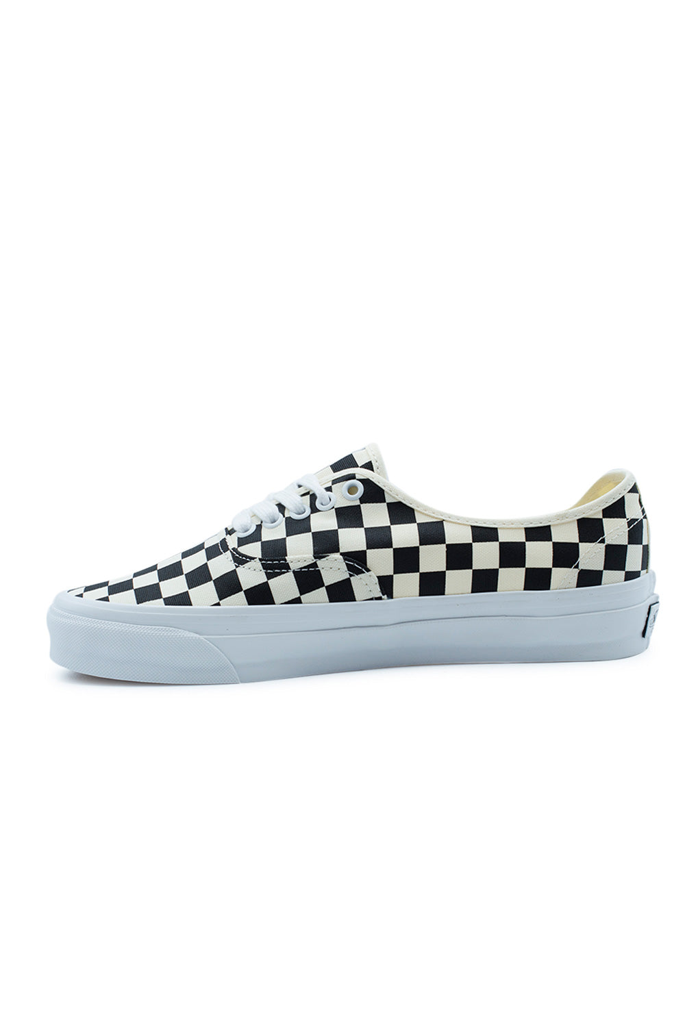 Lateral view of the Vans LX Authentic Reissue 44 Shoe in Checkerboard Black / Off White featuring screen-printed 226g canvas, archival Style 44 proportions, premium Vans construction, higher rubber sidewall, Osnaburg reinforcement and legendary checkerboard skate sneaker design.