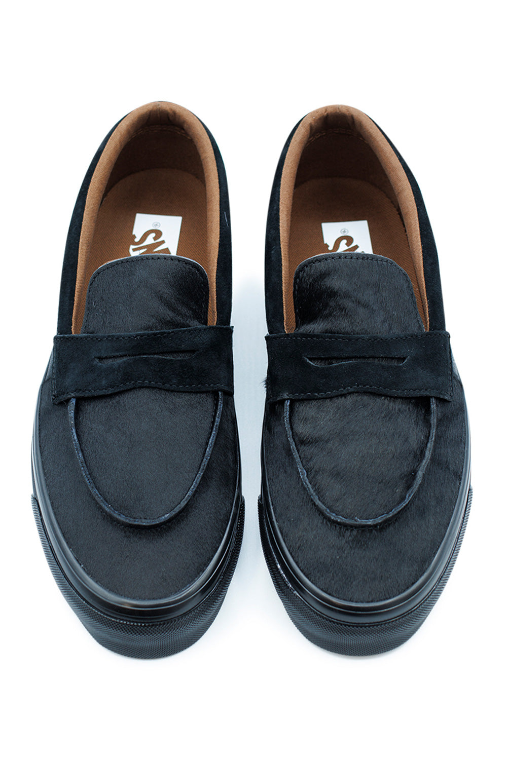 top view Vans Loafer 53 black pony hair showcasing refined monochrome design, soft textured leather upper and slip-on penny loafer construction with cushioned comfort insole