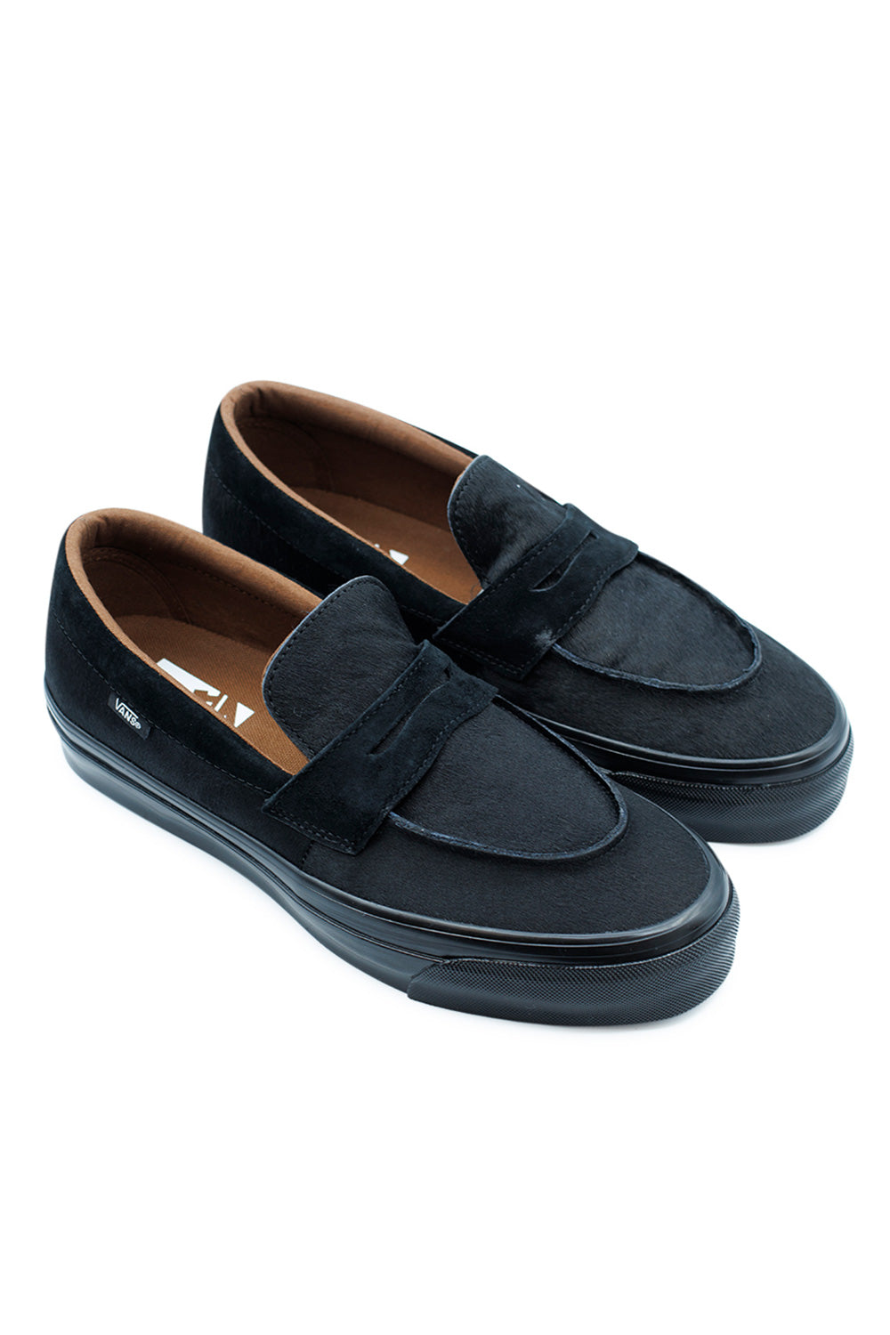 pair of Vans LX Loafer 53 Pony Hair Black combining luxury streetwear style with classic loafer silhouette, versatile all black casual shoe for modern fashion and skate culture