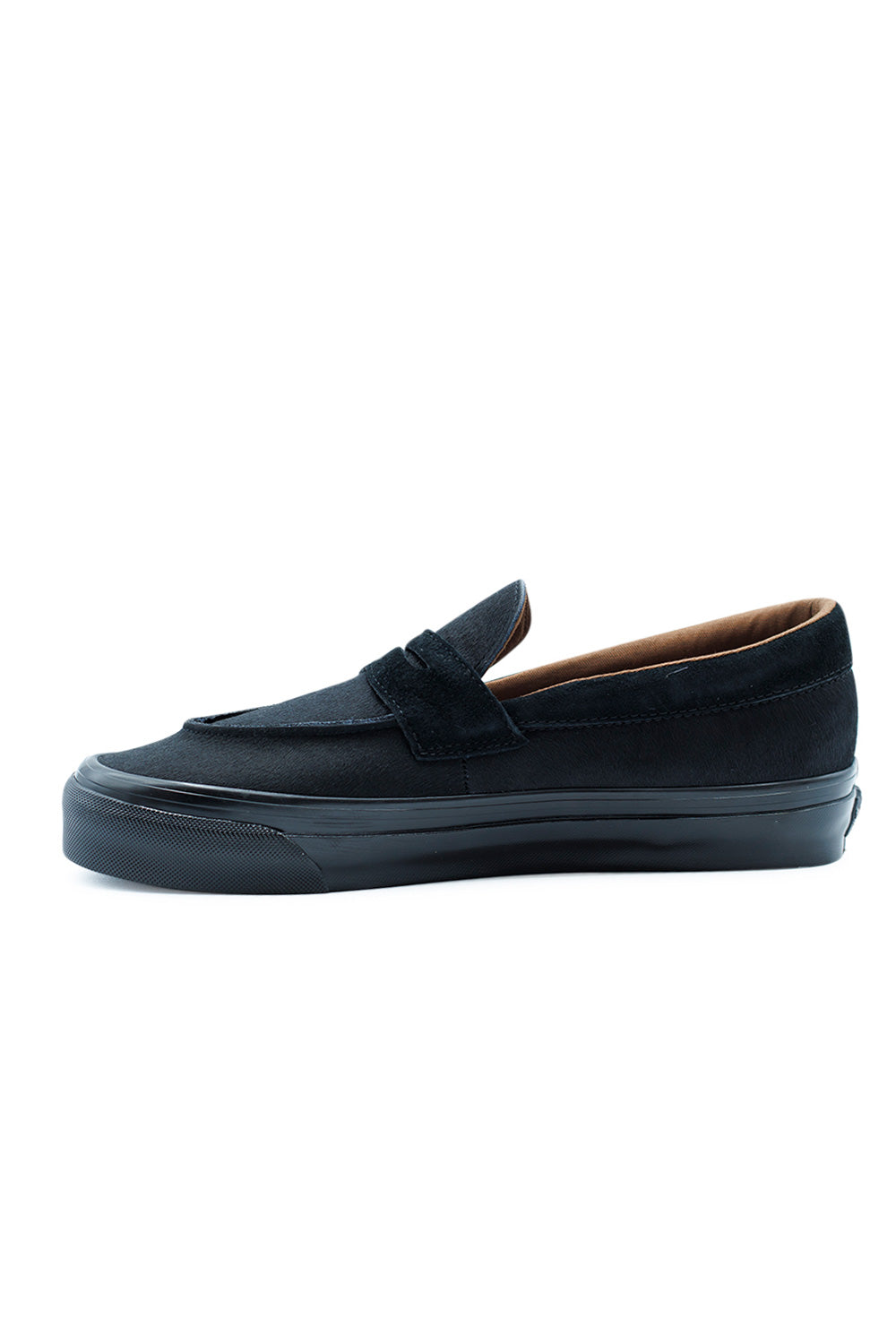 angled view Vans black pony hair loafers featuring premium textured leather, clean stitching details and elevated Vans LX design for high-end casual and smart streetwear looks