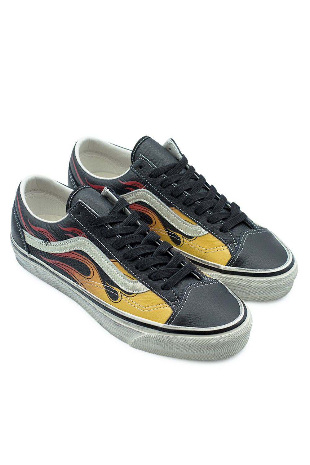 angled pair Vans Old Skool 36 LX Flame Black showing flame graphics on leather upper, iconic Vans side stripe and premium Vault level craftsmanship