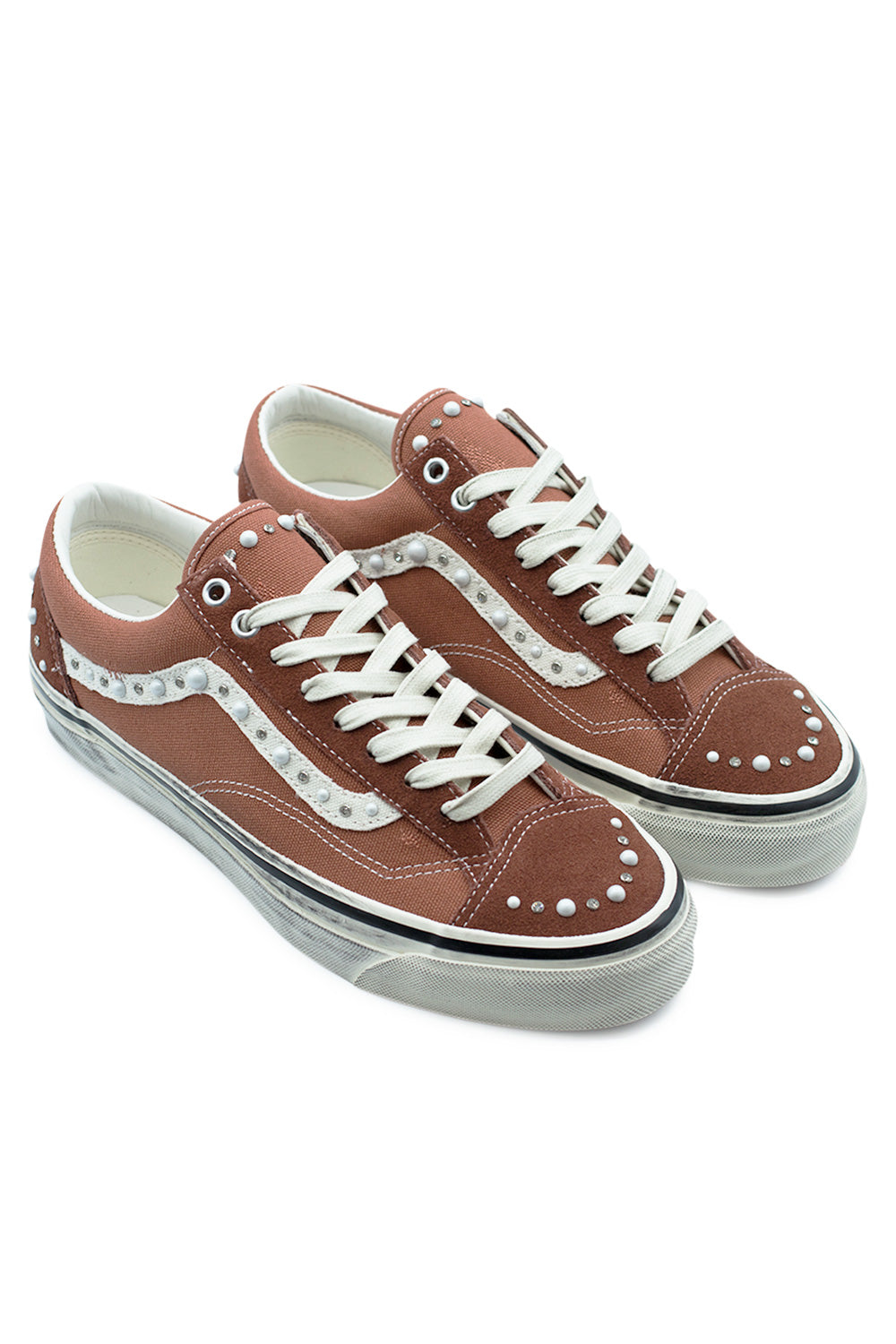 angled pair Vans Old Skool 36 LX pearlized rust bronze sneakers with decorative pearl accents, premium materials, retro skate aesthetic and durable vulcanized rubber outsole