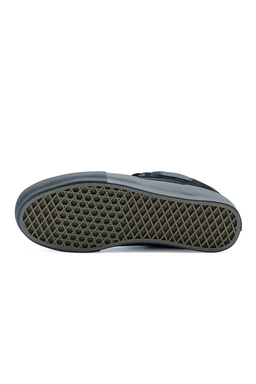 Bottom view of the dark gum rubber vulcanized outsole on the Vans Skate Half Cab shoe, showing the proprietary SickStick waffle grip pattern built for maximum skateboard control, durability, and direct board feel.