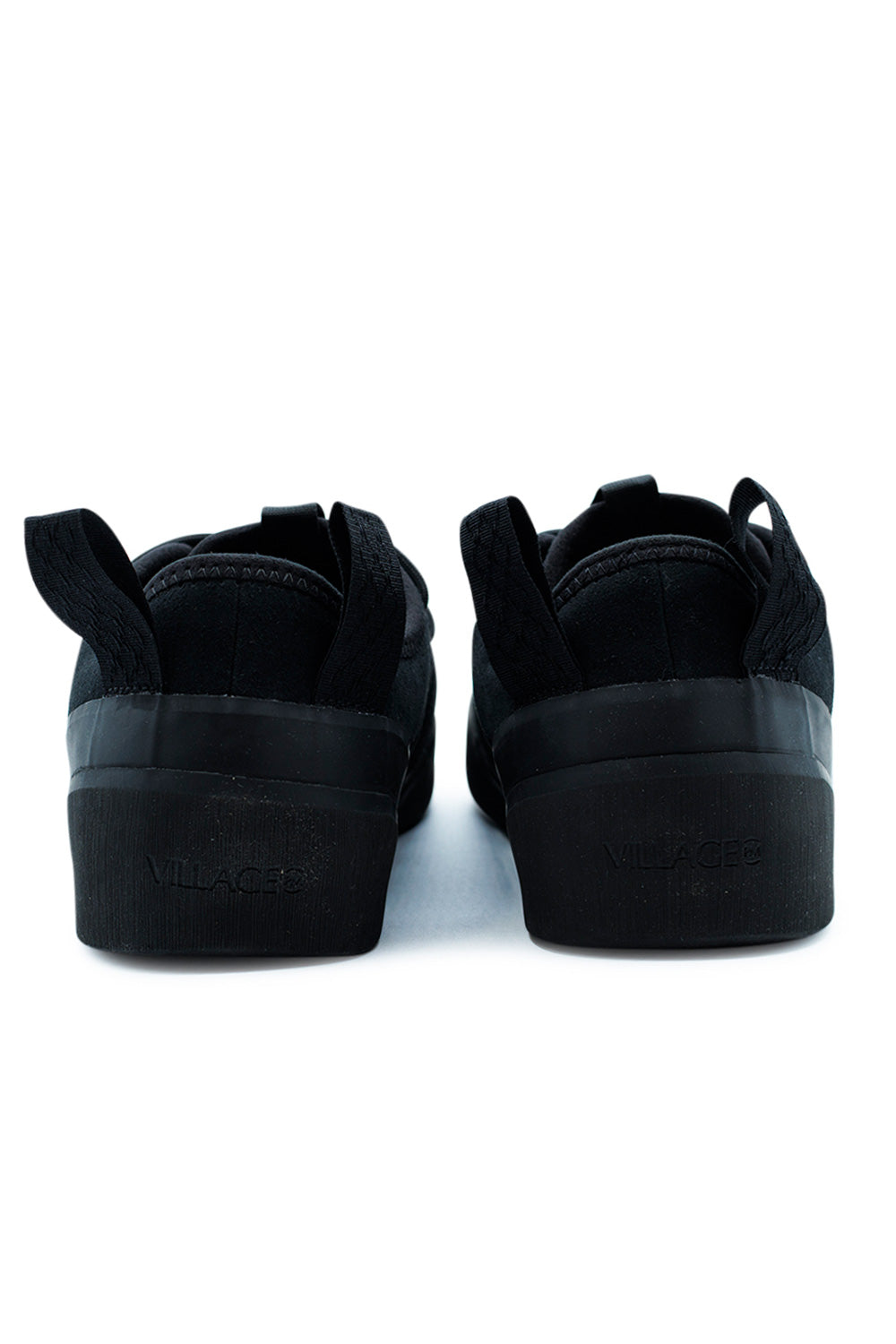 Rear view of Village PM 1PM Black Natural Black skateboarding sneaker highlighting pull tabs, padded heel structure and durable rubber midsole with Village branding