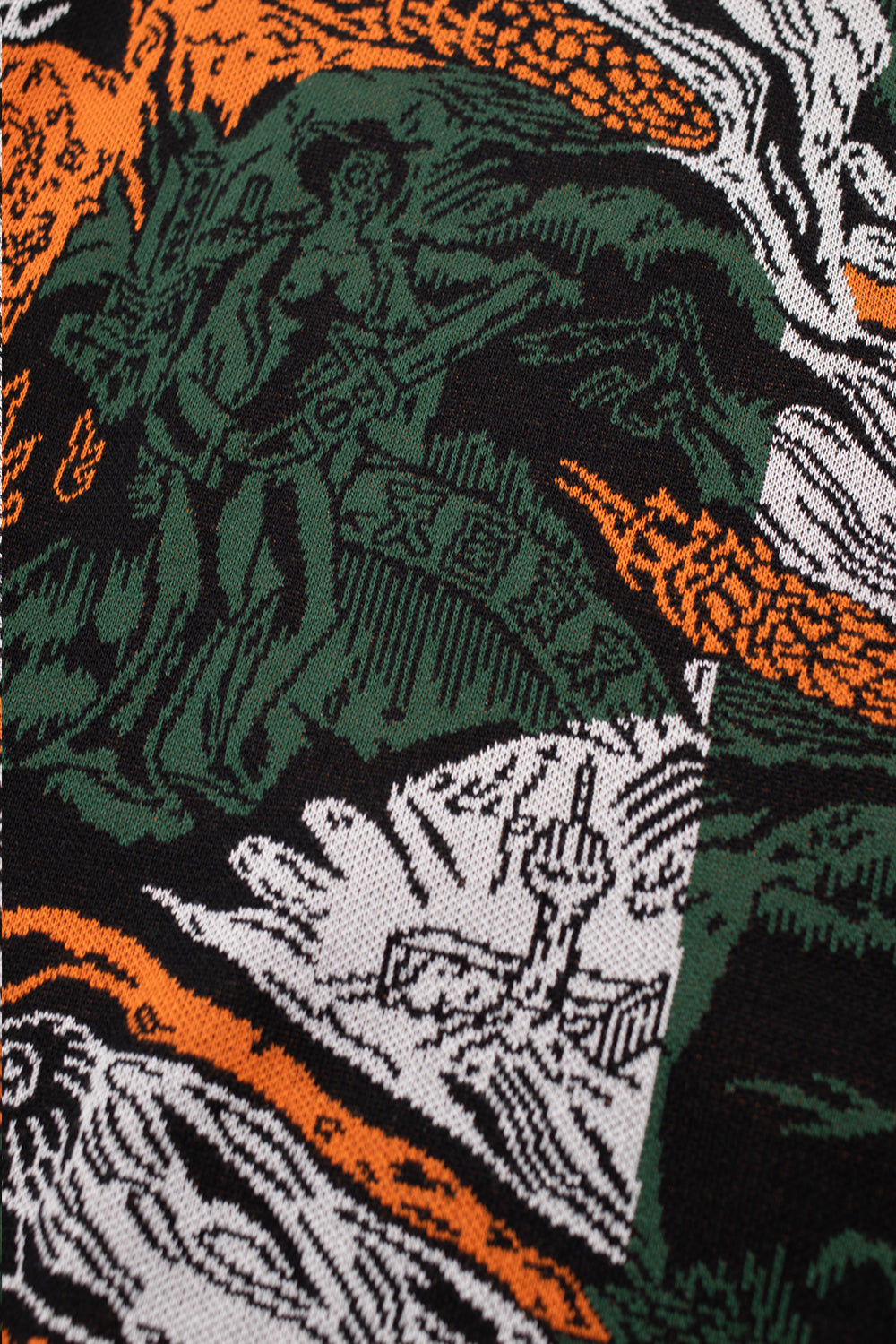 macro view of Wacko Maria jacquard knit fabric highlighting complex woven pattern, soft cotton rayon silk blend and high-end Japanese sweater construction