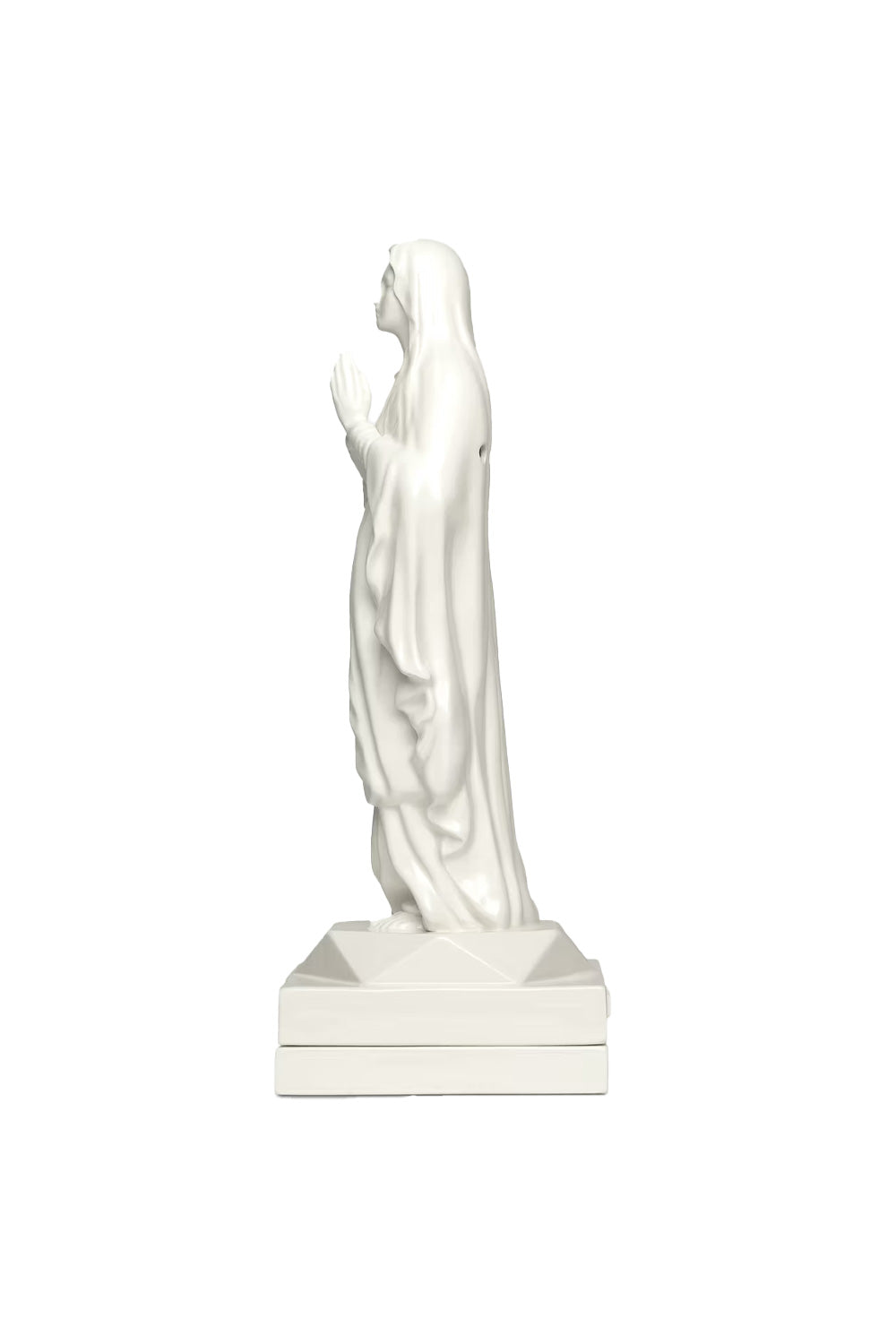 Side profile view of the white ceramic Wacko Maria Maria Incense Burner sculpture, displaying its flowing drapery lines and clean silhouette.