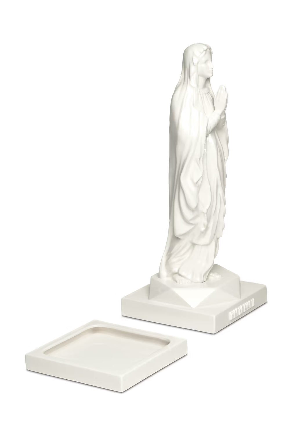 Angled view of the white Wacko Maria Maria Incense Burner shown separated from its integrated ceramic base chamber holder.