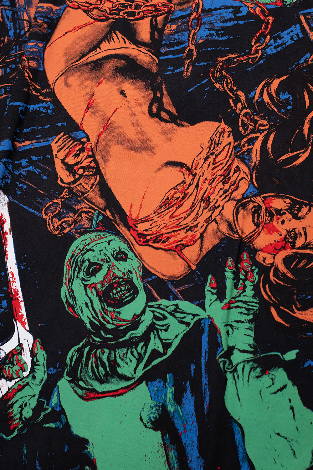Wacko Maria x Terrifier collaboration shirt fabric detail with chaotic horror scene graphics, wide fit summer shirt, premium Japanese-made rayon with cinematic artwork