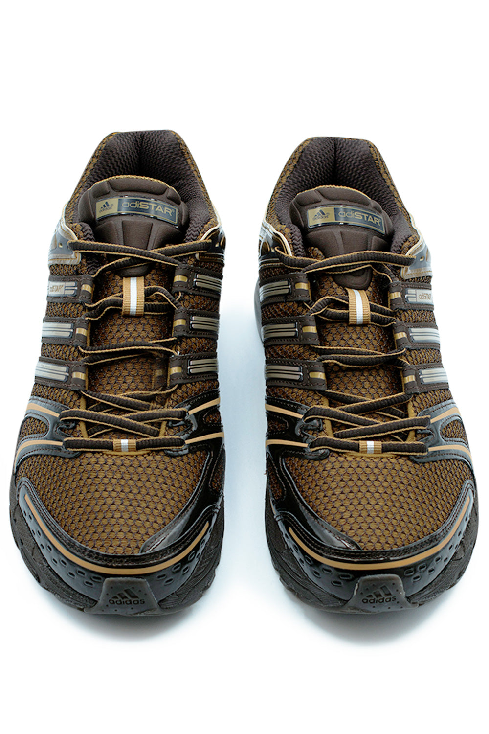 Top view of Adidas Adistar Control 5 Bronze Strata running sneaker featuring layered mesh construction, classic lace system and premium 2000s tech runner aesthetic in dark brown tones