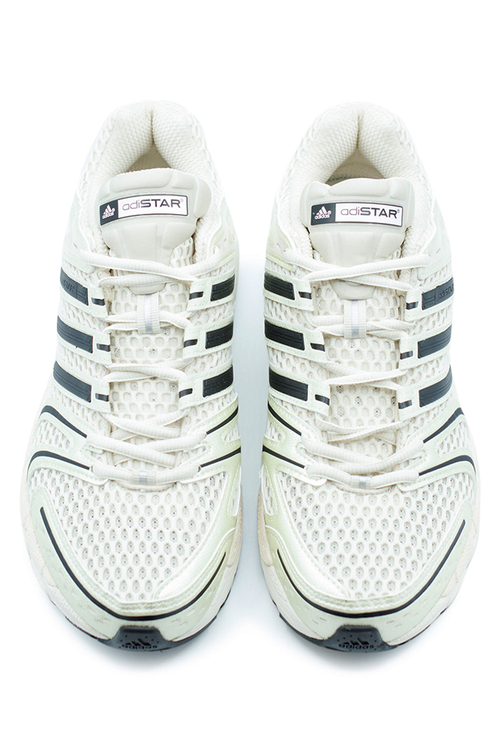 Adidas Adistar Control 5 Shoe Cloud White Core Black Alumina, Adidas Originals sneaker featuring metallic detailing and open-mesh construction.