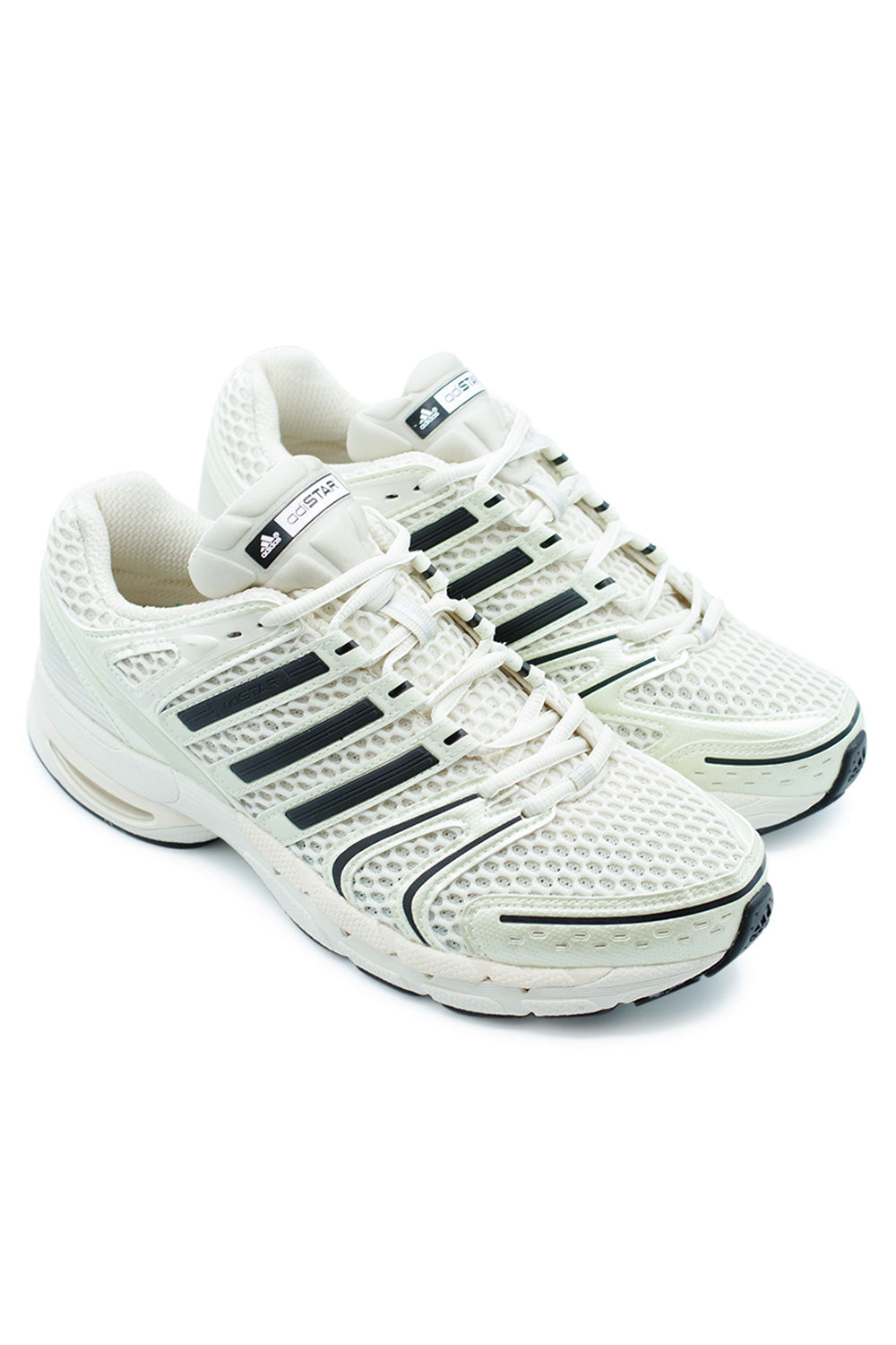 Side view of Adidas Adistar Control 5 Cloud White Core Black Alumina, Y2K-style runner blending vintage performance design with modern streetwear appeal.