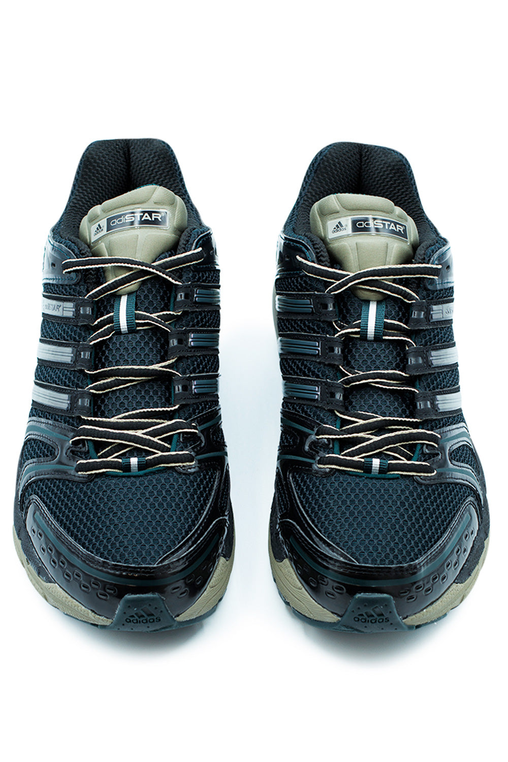 Top view Adidas Adistar Control 5 sneaker showing open mesh ventilation, layered synthetic panels, secure lace system and responsive EVA midsole for everyday comfort