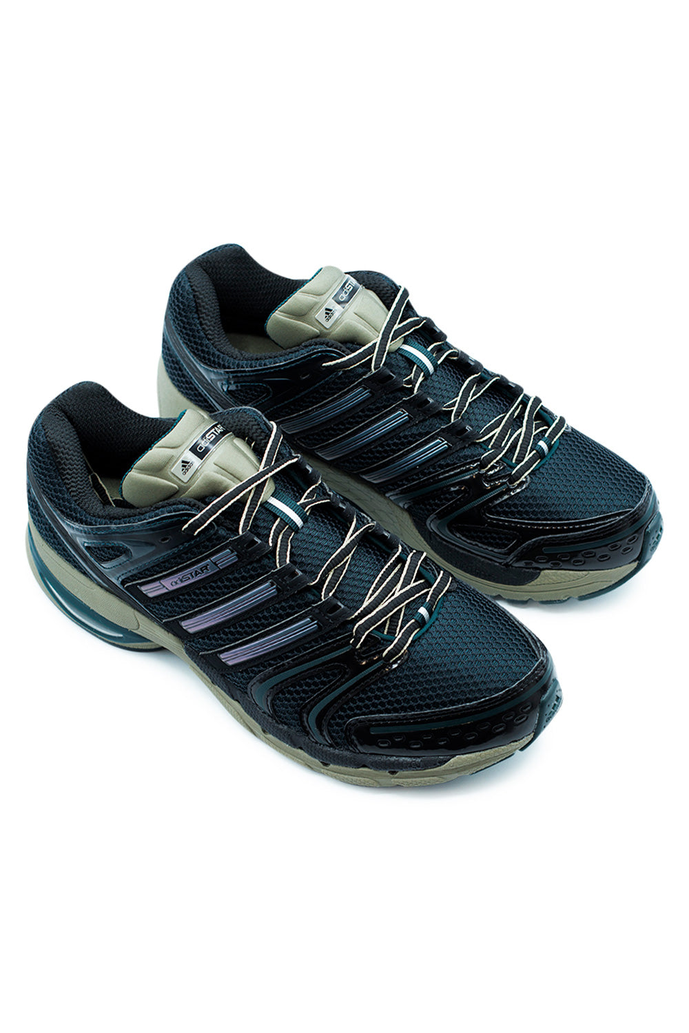 Angled view Adidas Adistar Control 5 Y2K inspired runner with breathable textile upper, metallic details, supportive TORSION system and street ready performance silhouette