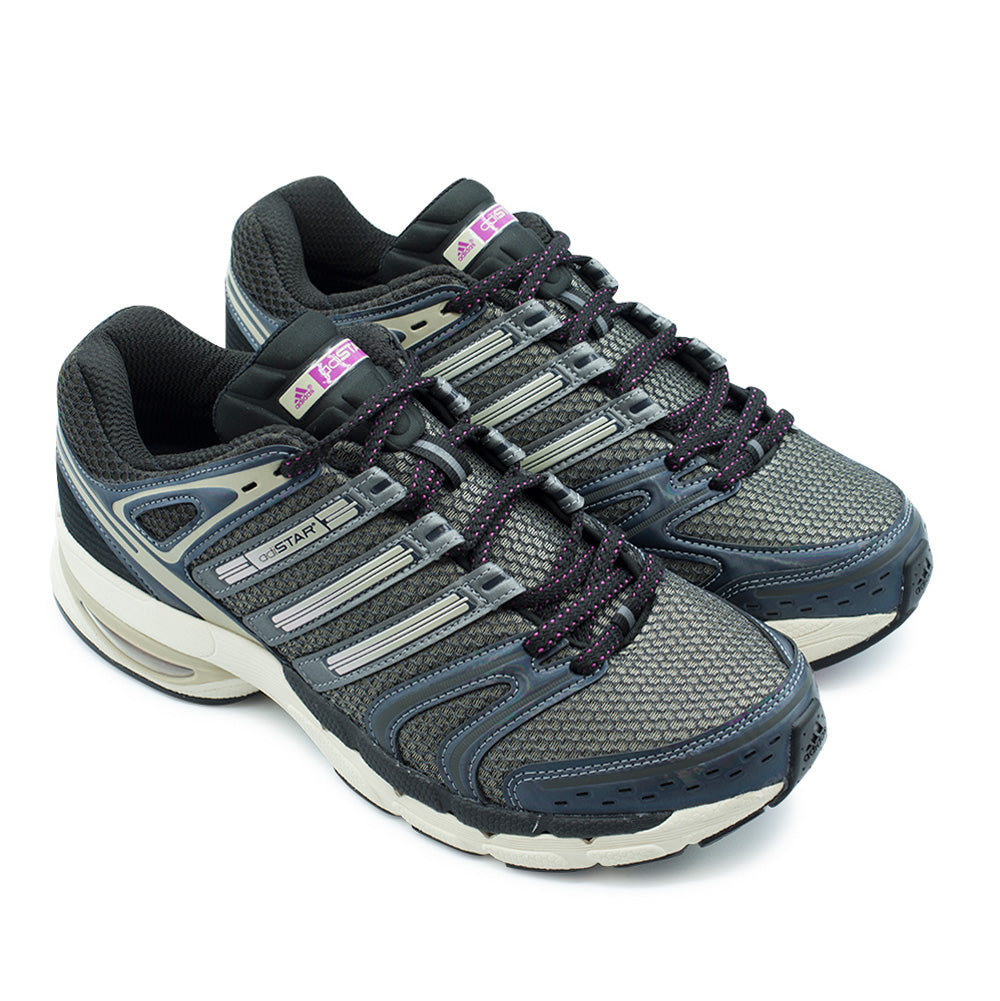 Pair angle studio presentation of the adidas Adistar Control 5 running shoes, highlighting the complex multi-layered Y2K design combining wide-gauge mesh, pearlescent synthetic stability cages, technical lace webbing loops, and chiseled cream midsoles.