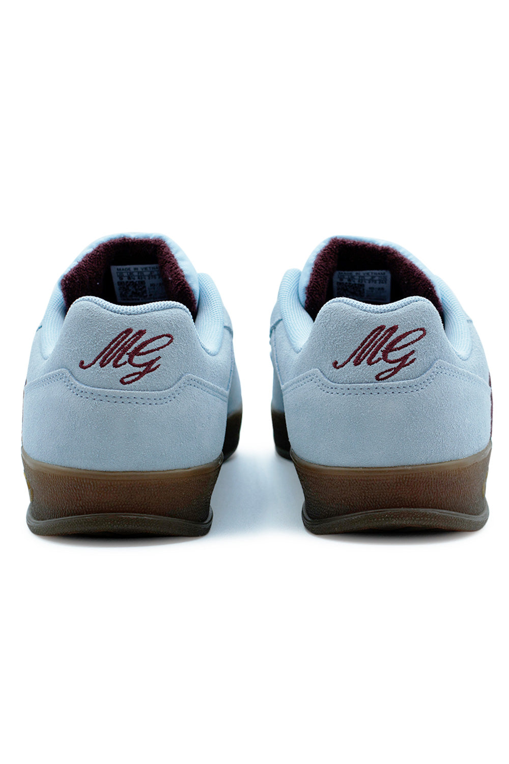 Back view of Adidas Aloha Super sneaker showing maroon heel tab and gum rubber outsole.