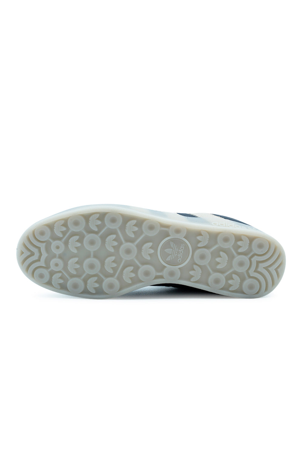 Full bottom view of the translucent rubber cupsole of the adidas Aloha Super, showcasing the Gazelle Indoor tread pattern with embedded adidas Trefoil logos.