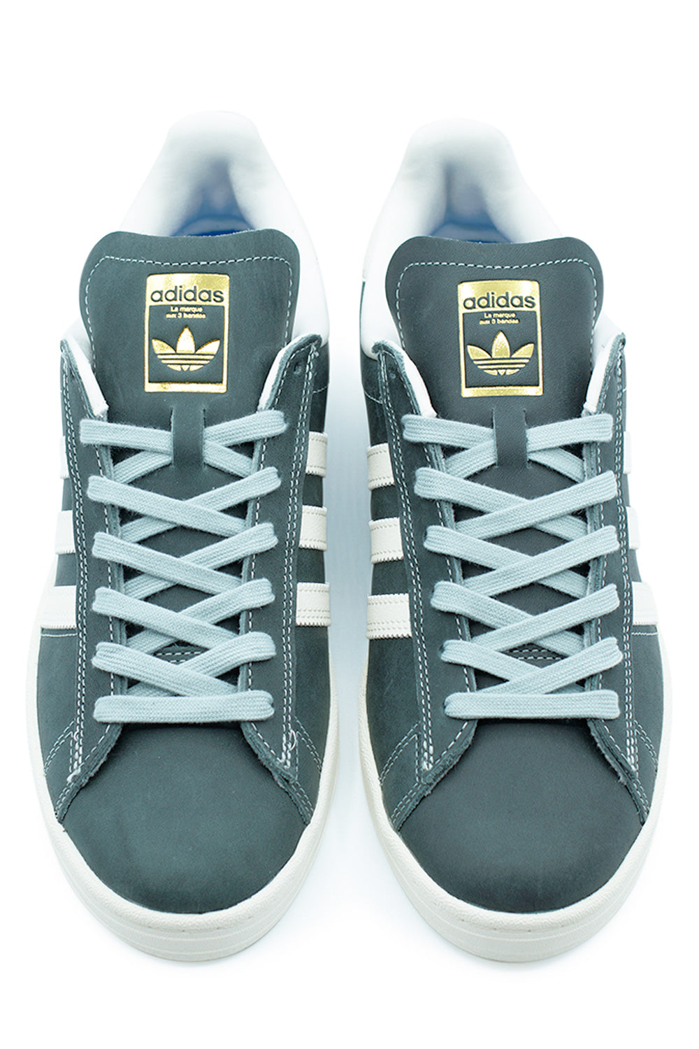 Top view of Adidas Campus ADV in Wonder Sage with gold-foil tongue branding, reinforced Adituff toe area and light grey laces engineered for high-performance skateboarding.”