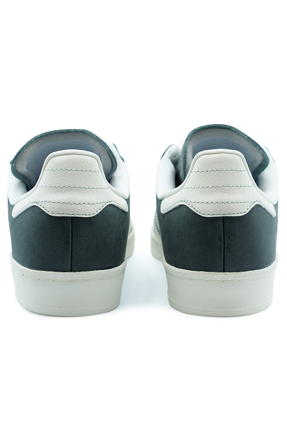 Heel view of Adidas Campus ADV Wonder Sage featuring padded collar, Chalk White leather detailing and supportive construction optimized for impact protection and stability.”