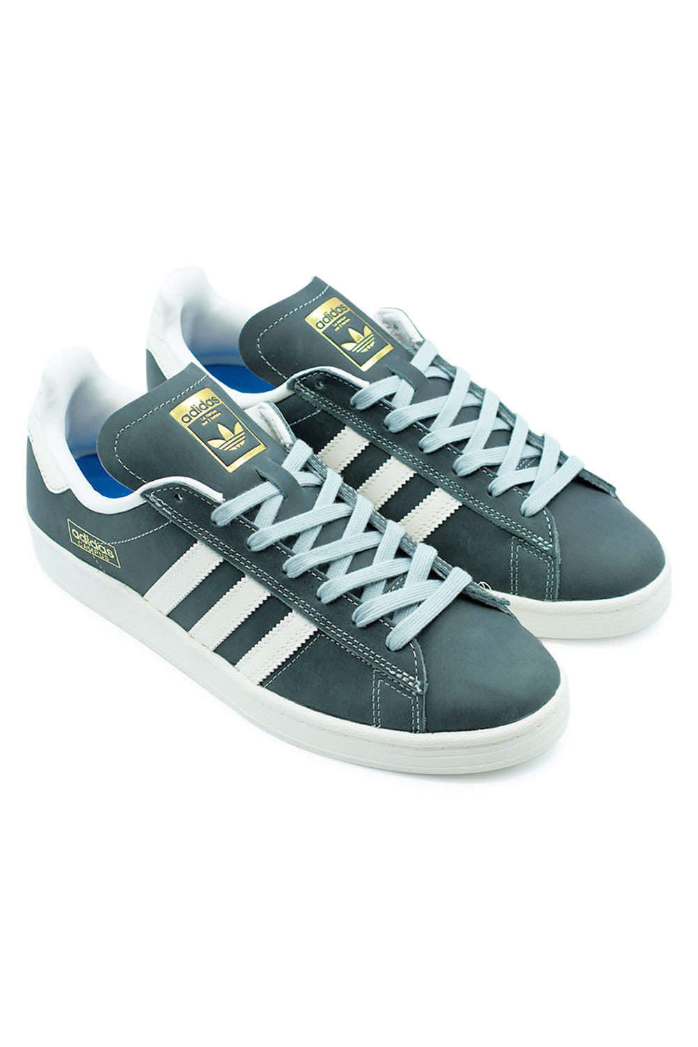 Angled pair shot of Adidas Campus ADV Wonder Sage / Chalk White skate shoes highlighting Bounce cushioning midsole, premium leather build and signature 3-Stripes design.