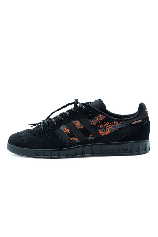 Adidas Handball Top Mike Arnold Core Black Semi Impact Orange, premium suede and nubuck skate shoe reimagined from a vintage handball silhouette.