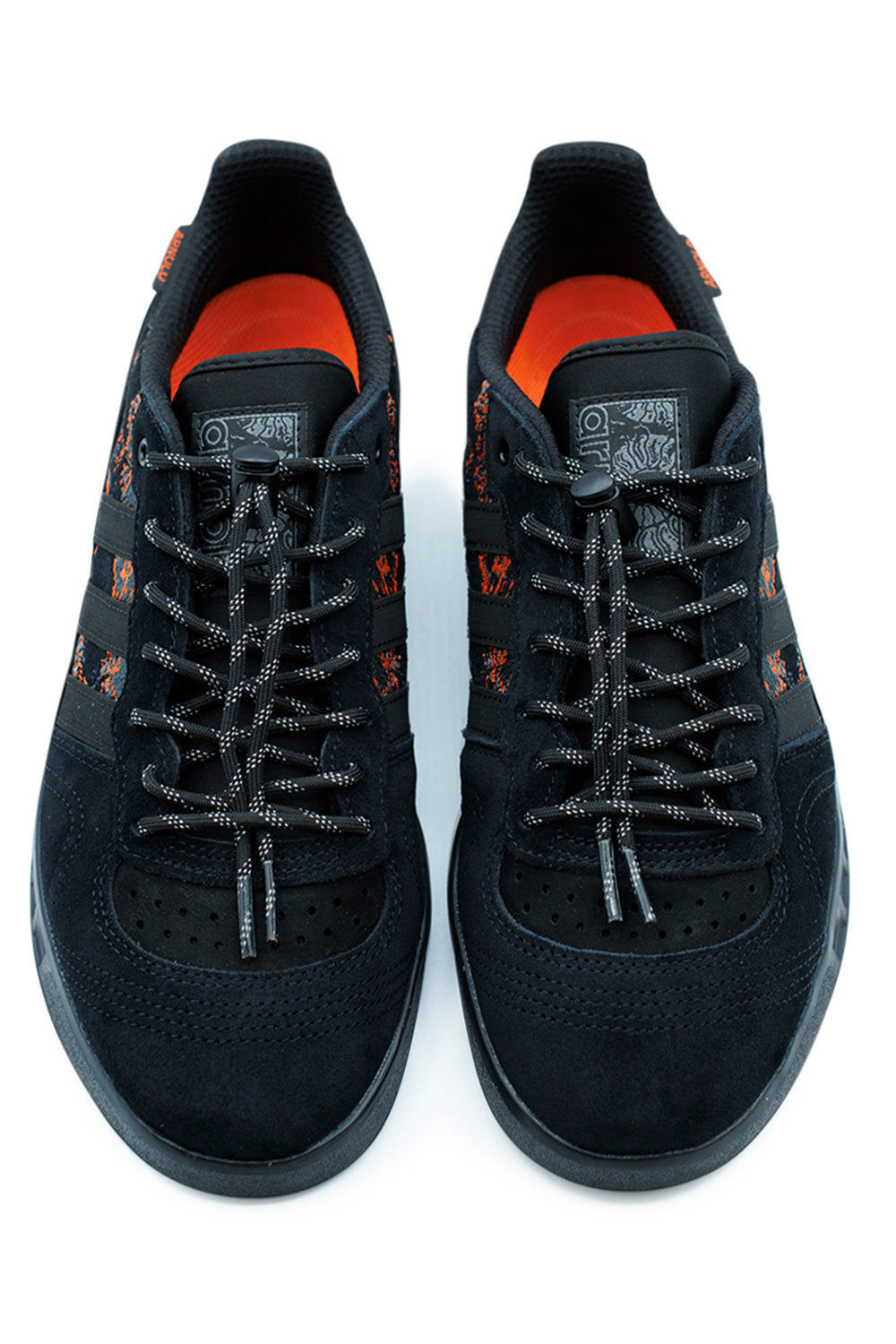 Adidas Handball Top Shoe Mike Arnold Core Black Semi Impact Orange, durable cupsole construction with embroidered suede detailing inspired by speed and motion.