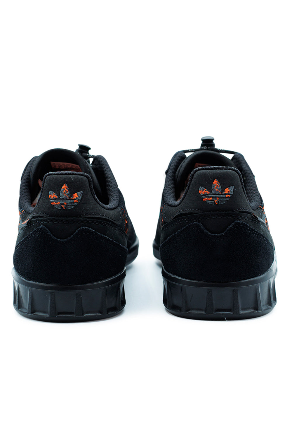 Unisex Adidas Handball Top Mike Arnold Core Black Semi Impact Orange, heritage-inspired skateboarding shoe combining premium materials and dynamic design.