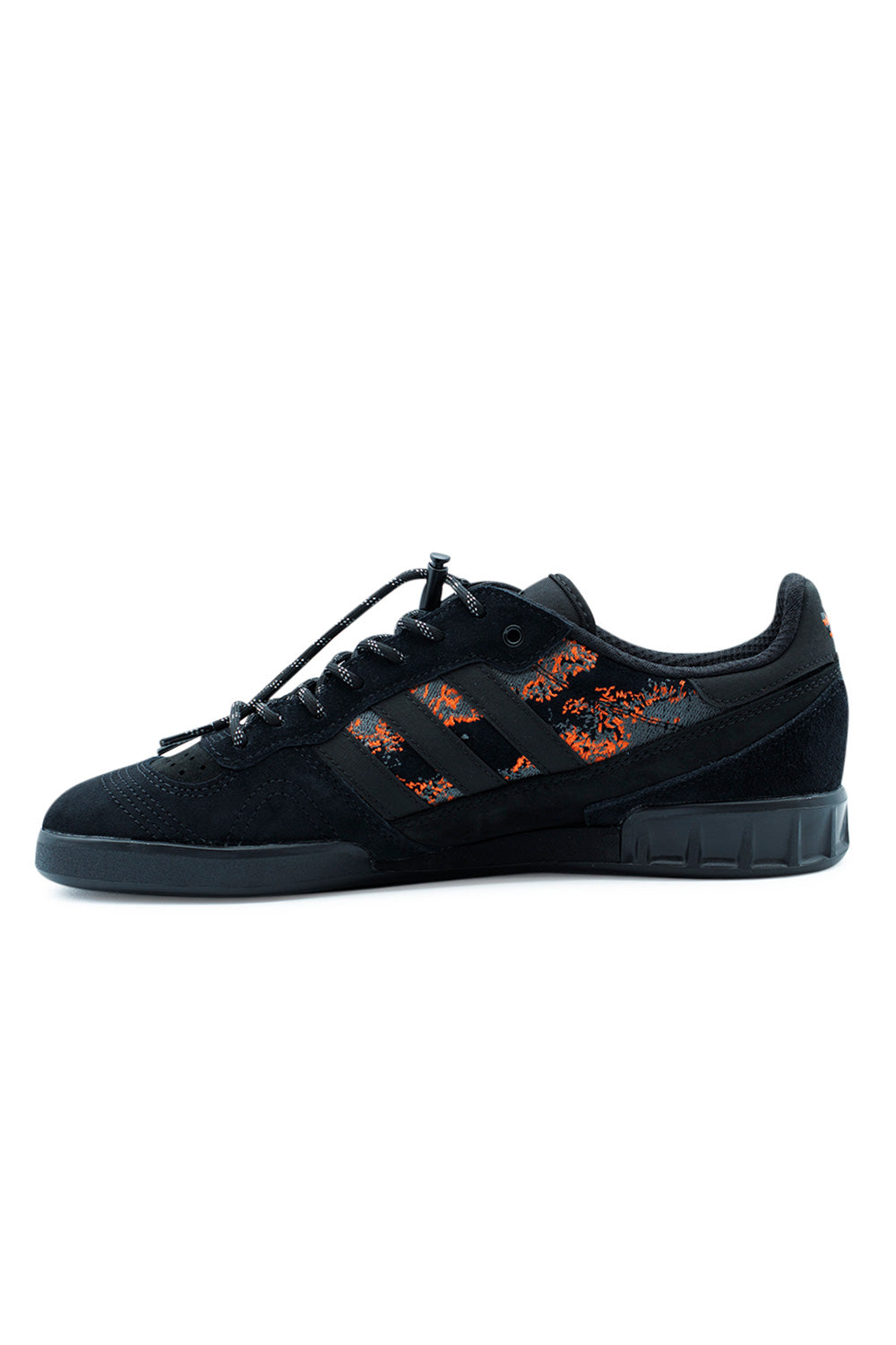 Adidas Skateboarding Handball Top Mike Arnold Core Black Semi Impact Orange, pro model shoe with tonal black suede upper and orange accent sparks.