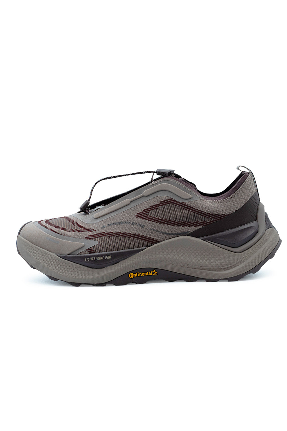 Lateral side profile view of the Adidas Holo Peak trail running sneaker in Trace Brown and Aurora Ruby, showcasing the breathable mesh upper with maroon Engineered by FOS graphics, sculpted brown Lightstrike Pro foam midsole, dark maroon heel cage overlay, and rugged Continental rubber tread outsole with yellow branding.
