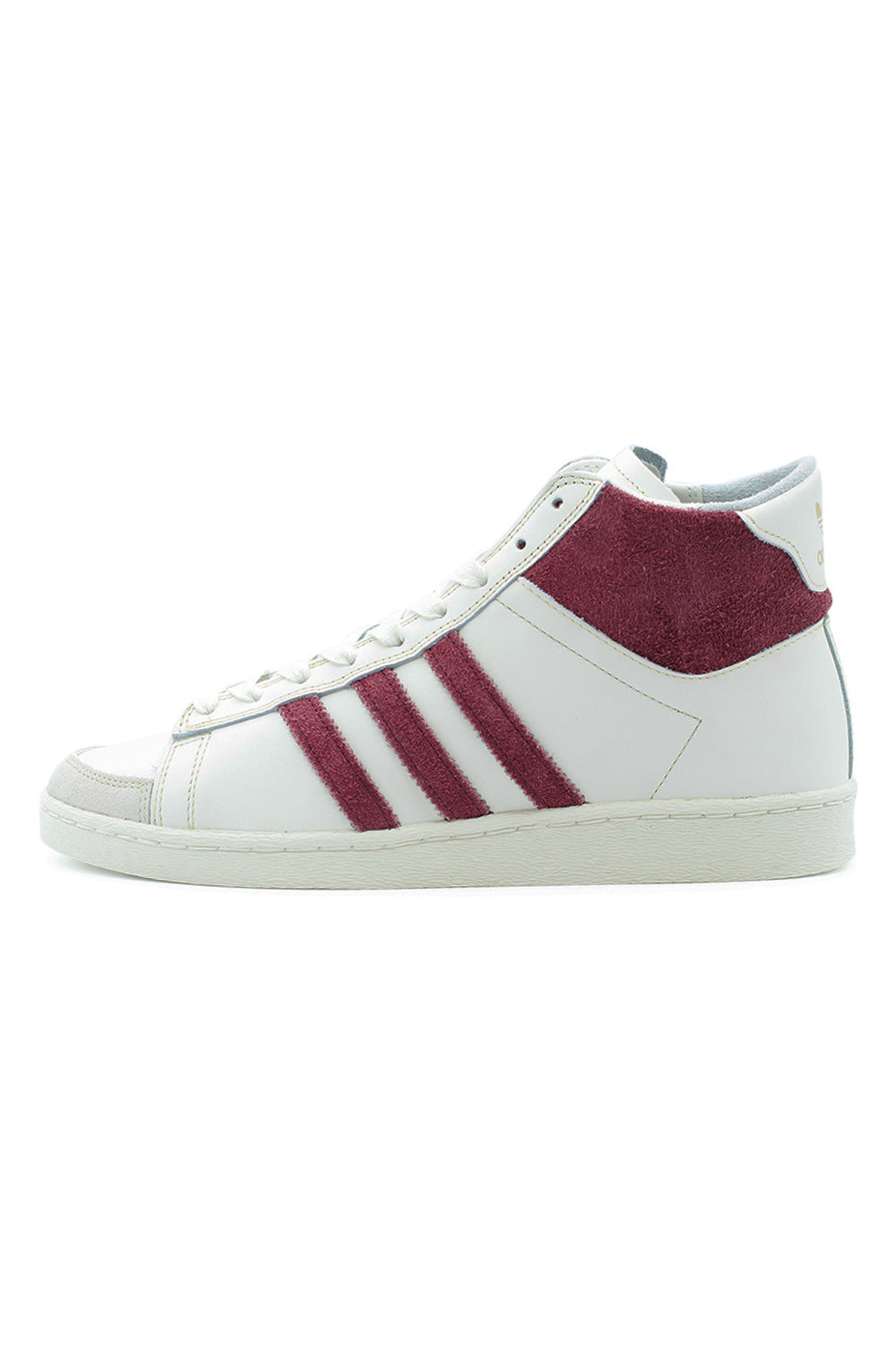 Adidas Jabbar Hi x Mark Gonzales limited edition sneaker, white leather basketball-inspired shoe with red suede stripes and cup sole.