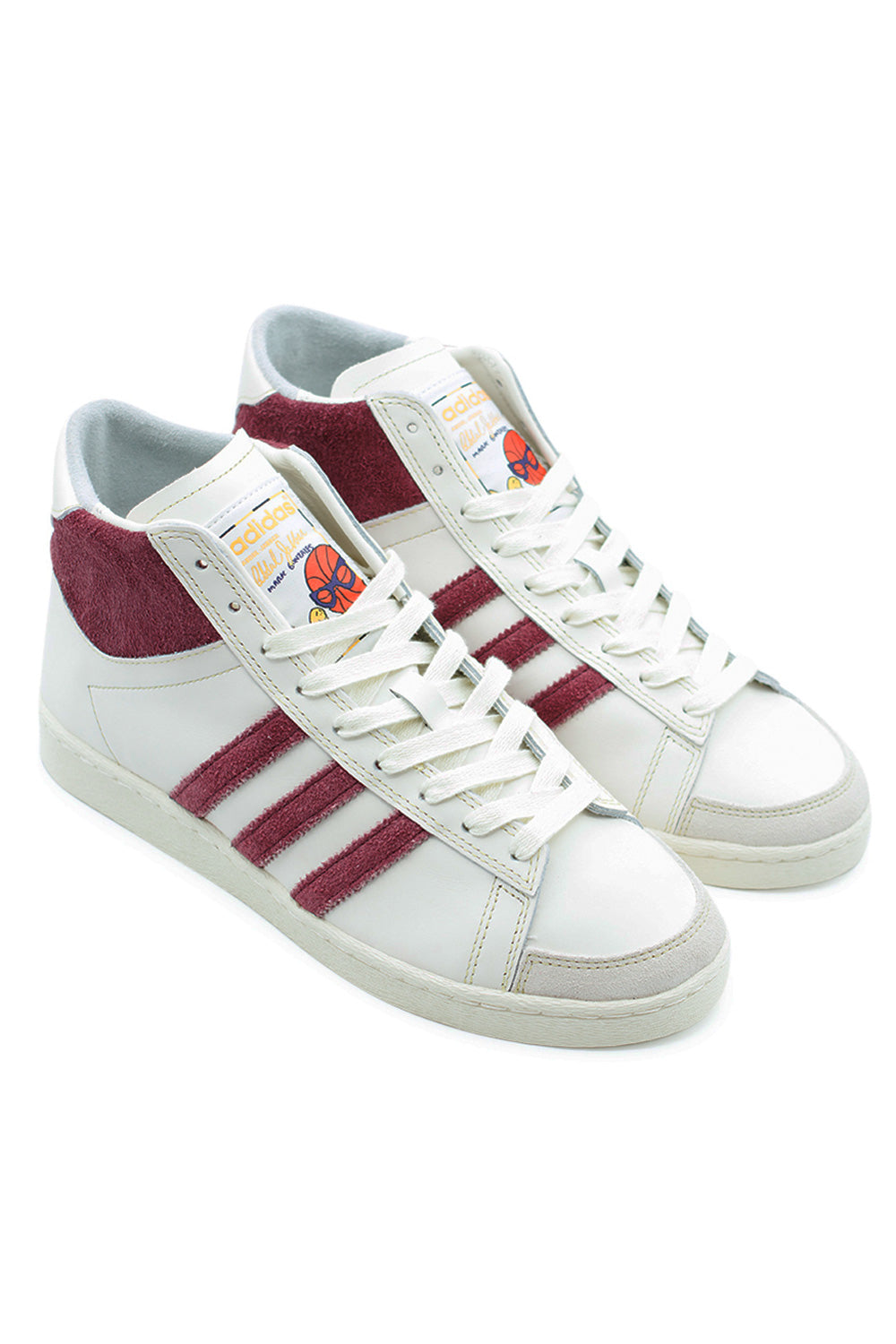 Side view of Adidas Jabbar Hi Mark Gonzales shoe, premium white leather upper with shadow red hairy suede heel cap and stripes.