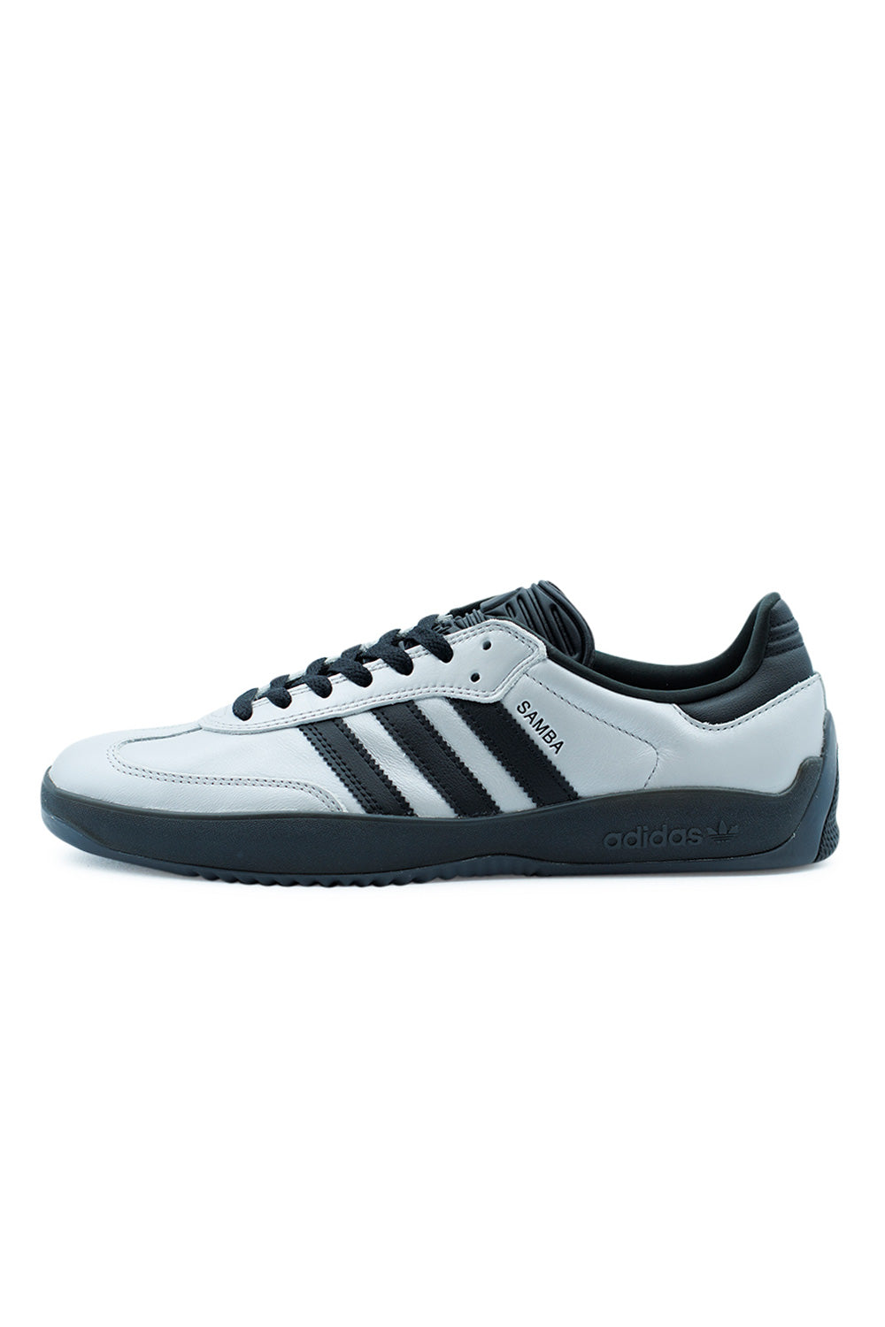 Adidas Puig Samba Silver Metallic Core Black skate shoes side view featuring silver leather upper, black three stripes, durable rubber outsole and lightweight cold cement construction sneaker HQ4747
