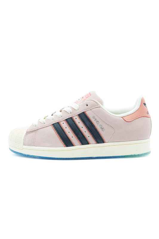 Adidas x SpongeBob Superstar Patrick shoe in Multicolor / Core Black / Wonder Clay featuring pink suede upper, navy Three Stripes and classic rubber shell toe – side profile product shot.