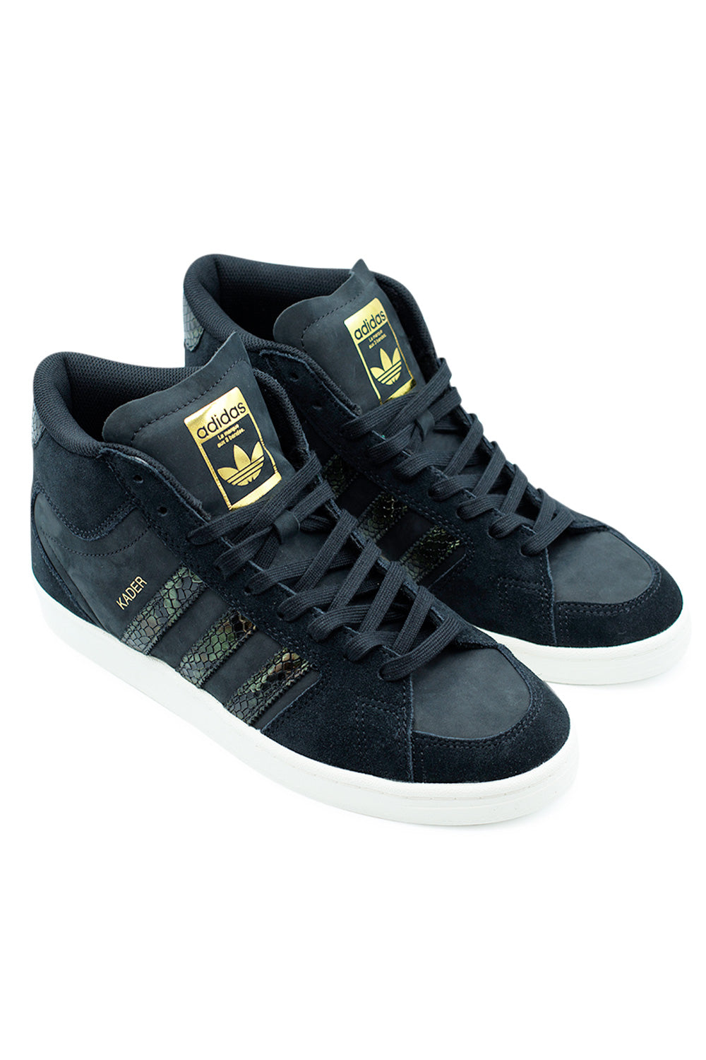 Side view of Adidas Superskate Kader Sylla Core Black Supplier Color Off White, premium nubuck and suede upper with faux snakeskin stripes and golden logo.