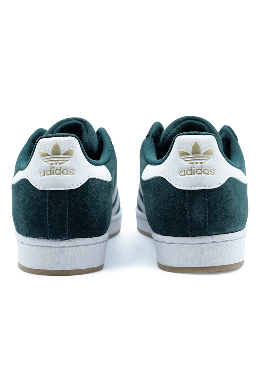 Rear heel detail of Adidas Superstar ADV Aurora Ivy Cloud White Gold Metallic sneaker highlighting white leather heel tab with gold Trefoil logo, reinforced suede construction and supportive cupsole