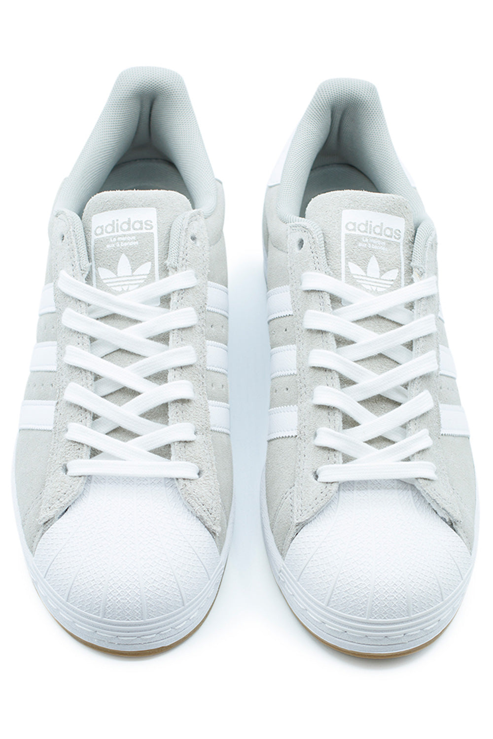 Front angle of Adidas Superstar ADV Clear Granite skate shoe with molded EVA insole, padded tongue, stitched cupsole and white shell toe – skate-ready adidas Originals streetwear sneaker with gum outsole.