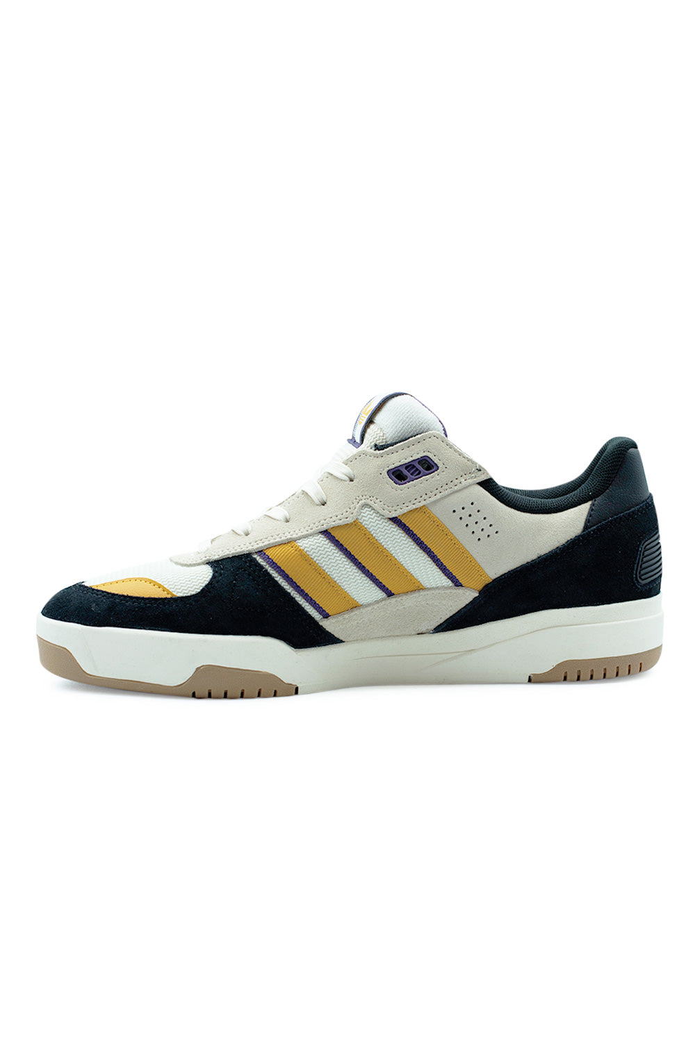 Medial side of adidas Tekkira Cup low top sneaker featuring lightweight Lightmotion midsole, supportive cupsole structure and suede mesh combination designed for flexibility and control