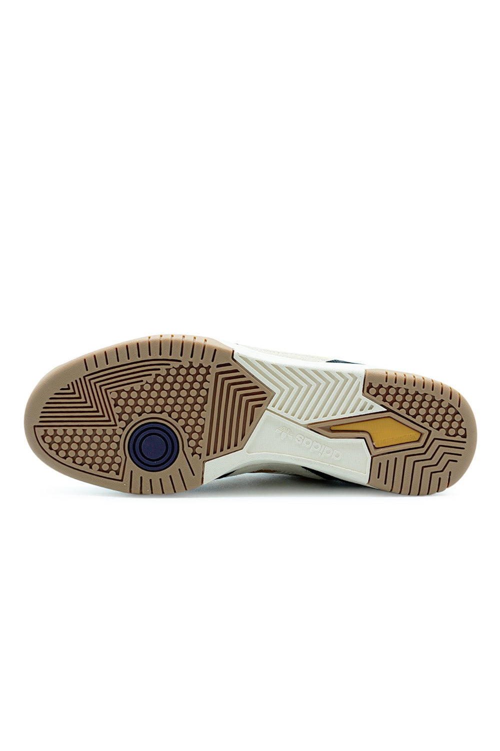 adidas Tekkira Cup outsole close-up displaying grippy gum rubber traction pattern, pivot points and cold cement cupsole construction engineered for skateboarding and urban movement