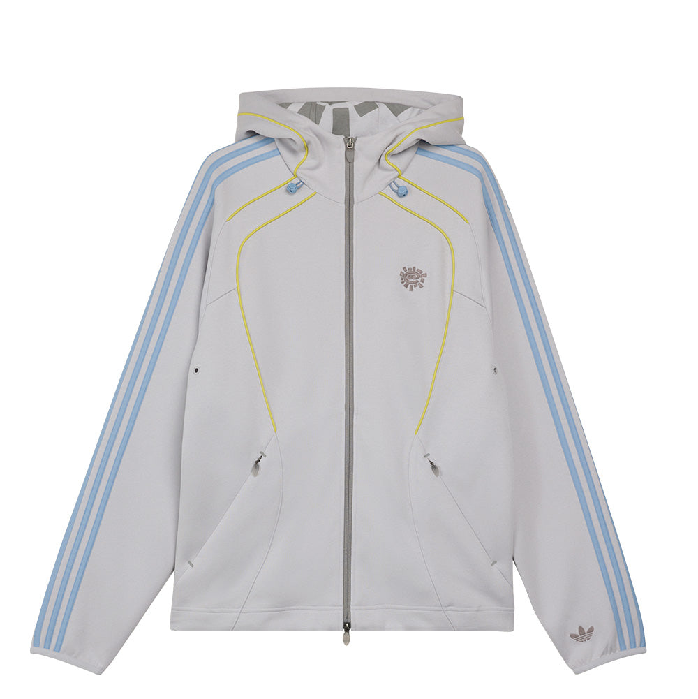 Front flat lay studio view of the adidas Skateboarding x ADWYSD Full Zip Hoodie in Light Solid Grey, featuring a loose-cut track silhouette with baby blue Three Stripes down both sleeves, curved neon yellow piping, high-collar two-way front zipper, side zip pockets, embroidered chest logo, and small Trefoil logo on the sleeve cuff.