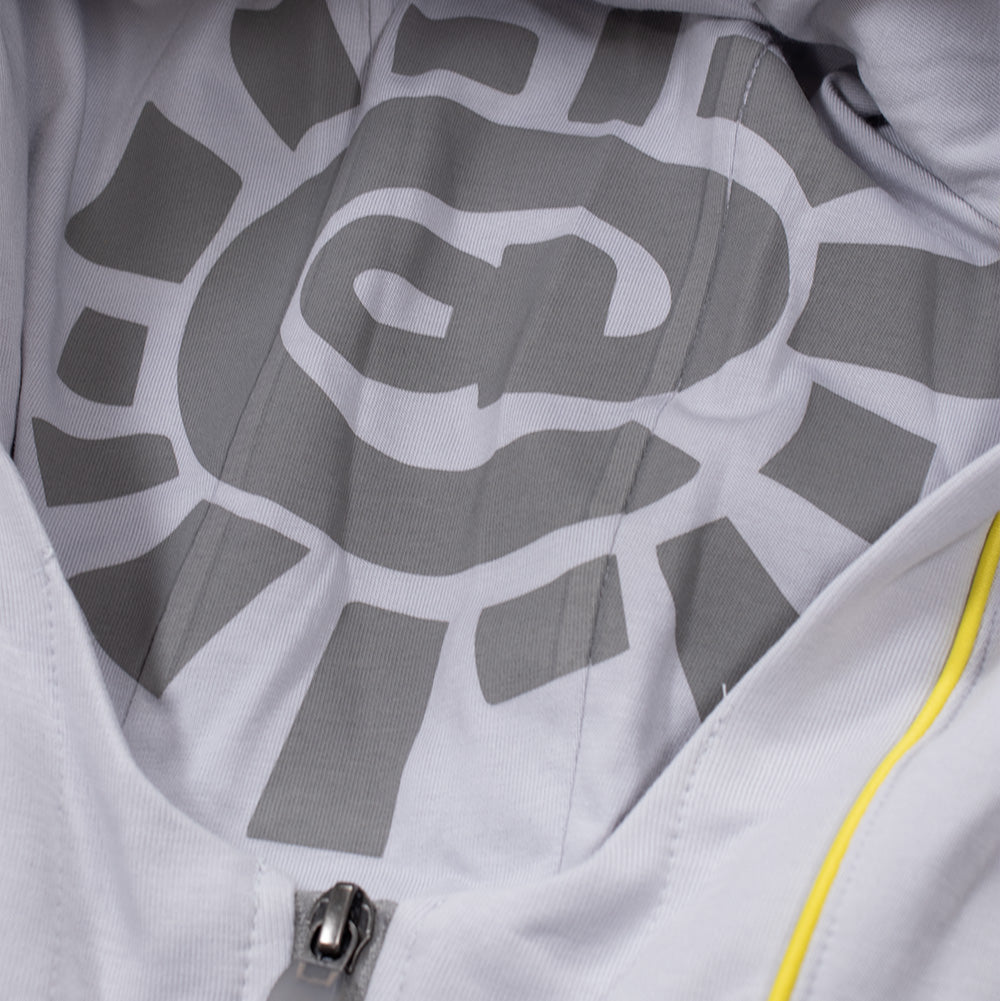 Macro studio view looking into the opened hood of the adidas x ADWYSD Full Zip Hoodie, displaying the inner cotton hood lining printed with an oversized tonal grey ADWYSD @Sun graphic above the metallic front zipper track.