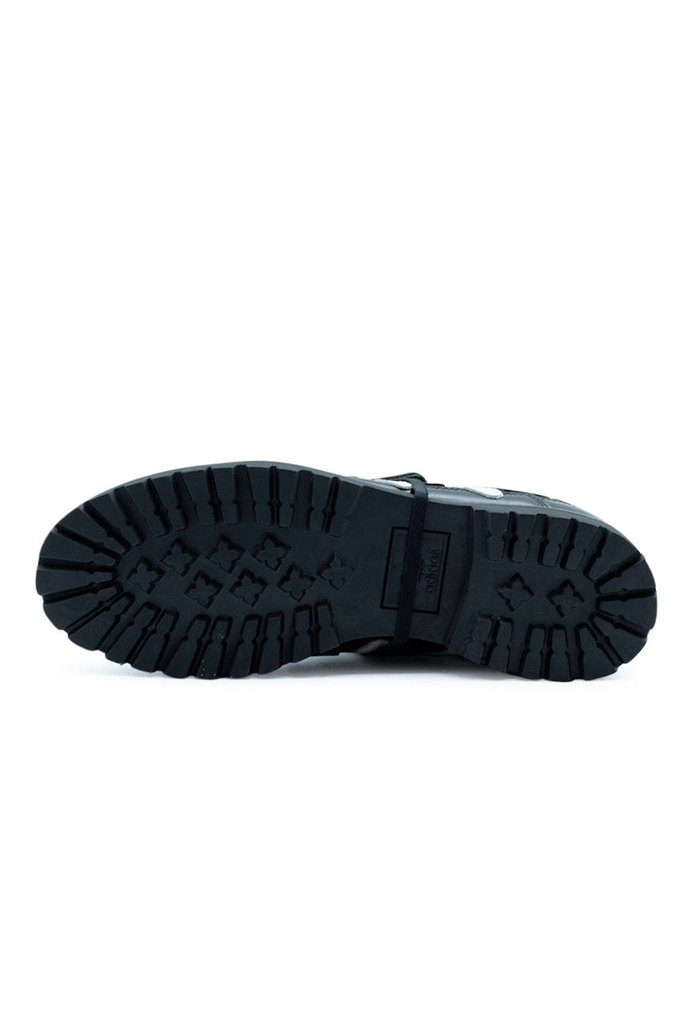 Bottom view of the Adidas x Brain Dead x Disney Predator KJ4289 revealing the heavy-duty lug outsole engineered for everyday wear, blending classic adidas football heritage with industrial boot tooling and premium lifestyle sneaker construction.