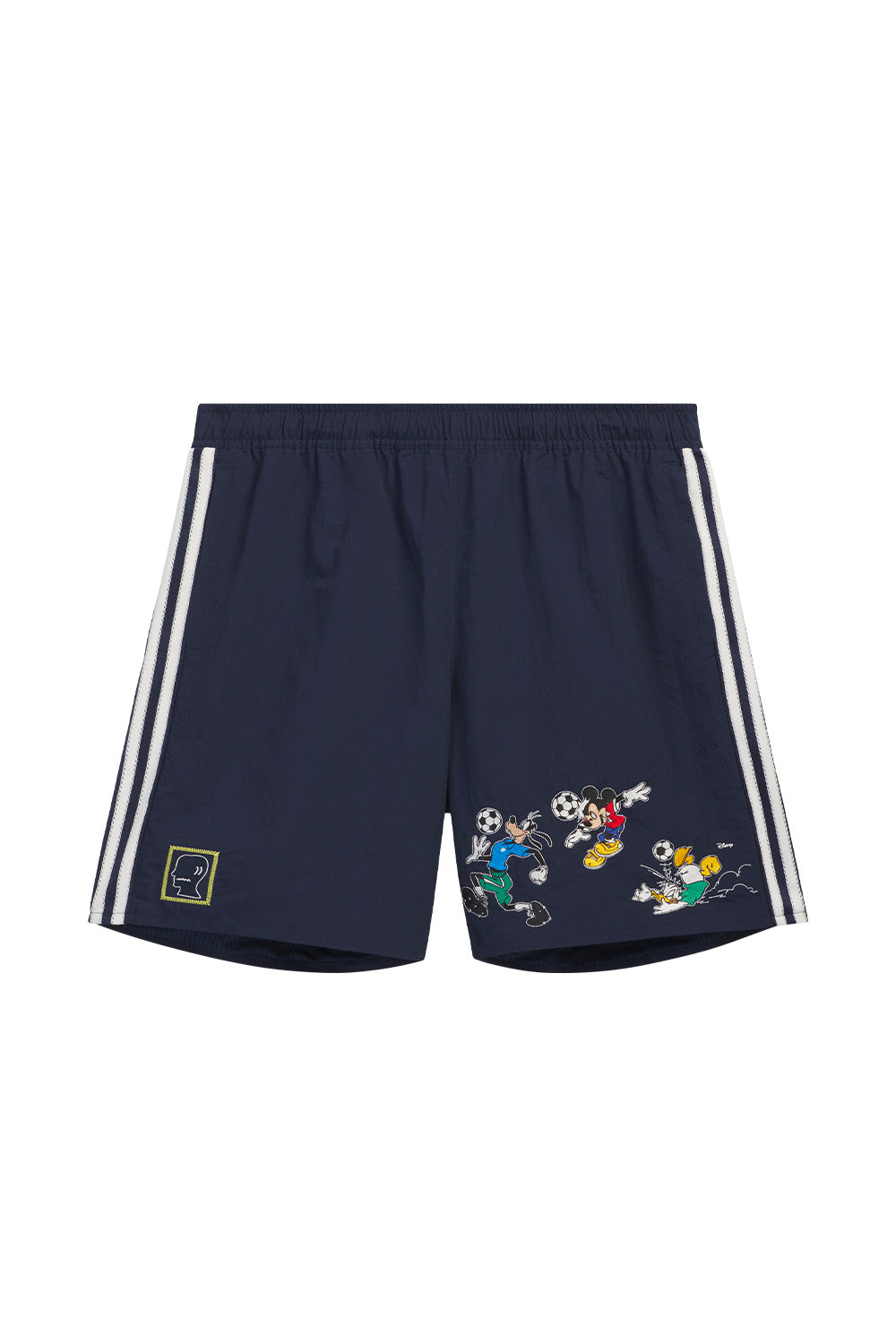 adidas x Brain Dead x Disney Short Core Navy front view featuring embroidered Mickey Mouse, Goofy and Donald Duck graphics, signature three stripes, Brain Dead logo patch, mesh lining, zip pockets and limited World Cup capsule collection design