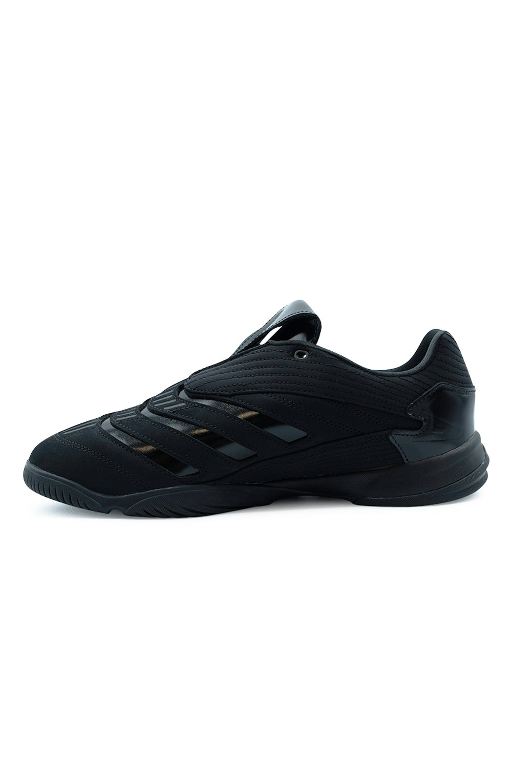 Medial side profile view of the black Adidas X Metalwood Studio Predator Sala shoe, illustrating the durable nylon canvas midfoot panel, curved Predator precision lines, and low-profile gum cupsole sidewall.