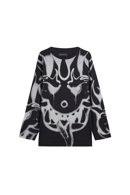 Front view of the black Adidas Y-3 X Chito Graphic Long Sleeve Tee, featuring a loose-fitting premium cotton jersey silhouette covered in large white airbrushed abstract monster face artwork across the chest and along both sleeves.
