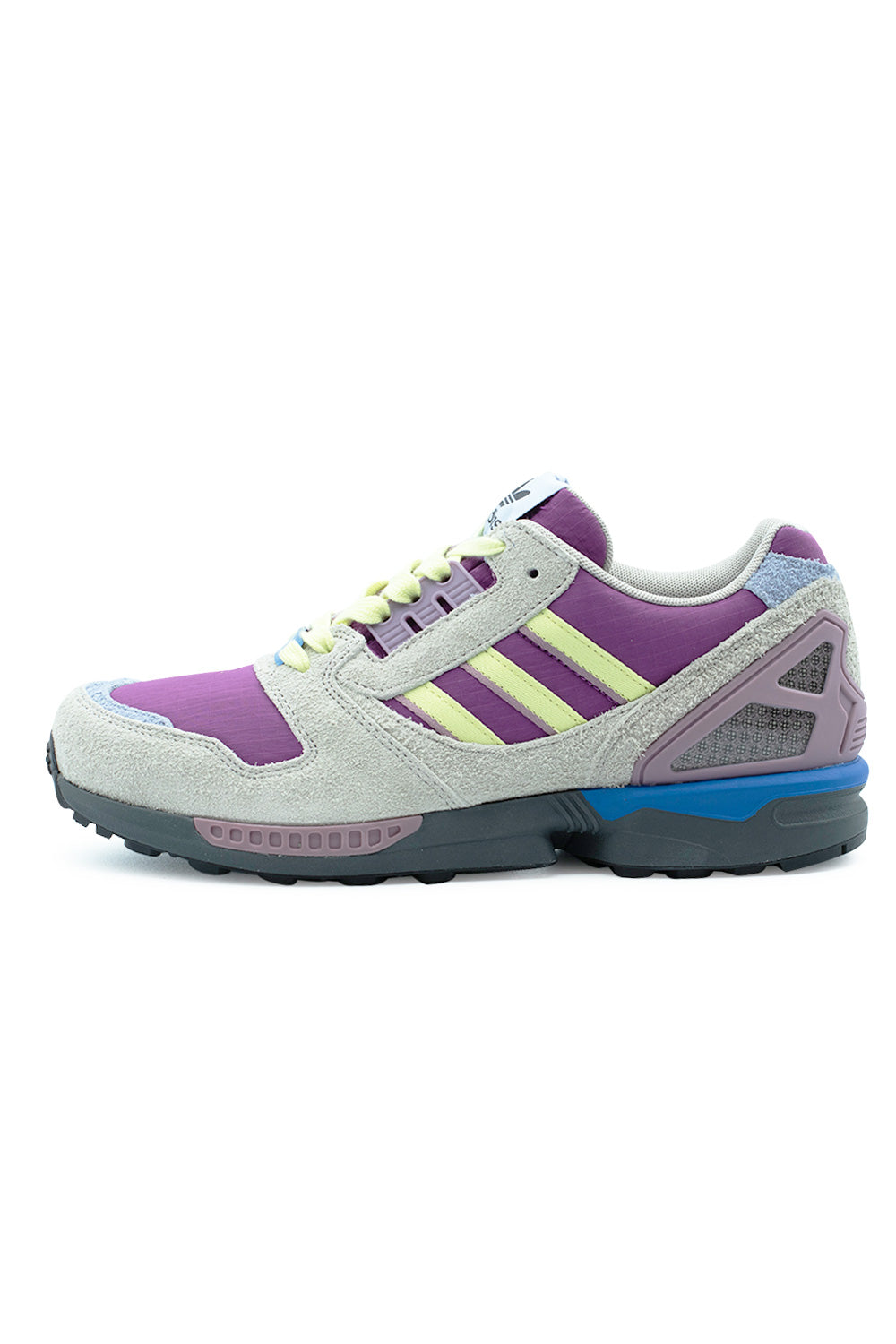 Lateral side view of the Adidas ZX 8000 sneaker in St Fade Ocean, Sand Strata, and Wonder Red, highlighting the deep magenta ripstop nylon base, light grey textured hairy suede overlays, pastel yellow serrated three stripes, mauve external TPU heel stabilizer cage, royal blue midsole accent, and dark grey EVA foam sole unit.