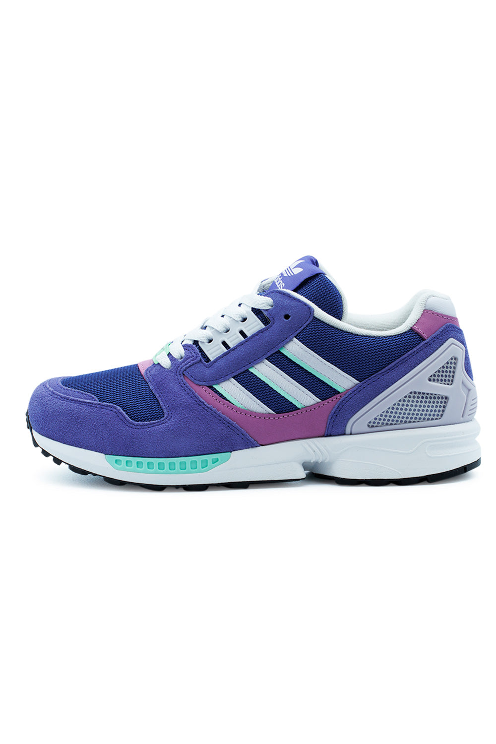 Lateral side view of the adidas ZX 8000 sneaker in Purple and Frozen Purple, featuring layered suede panels, breathable mesh, and a light green accent on the midsole.