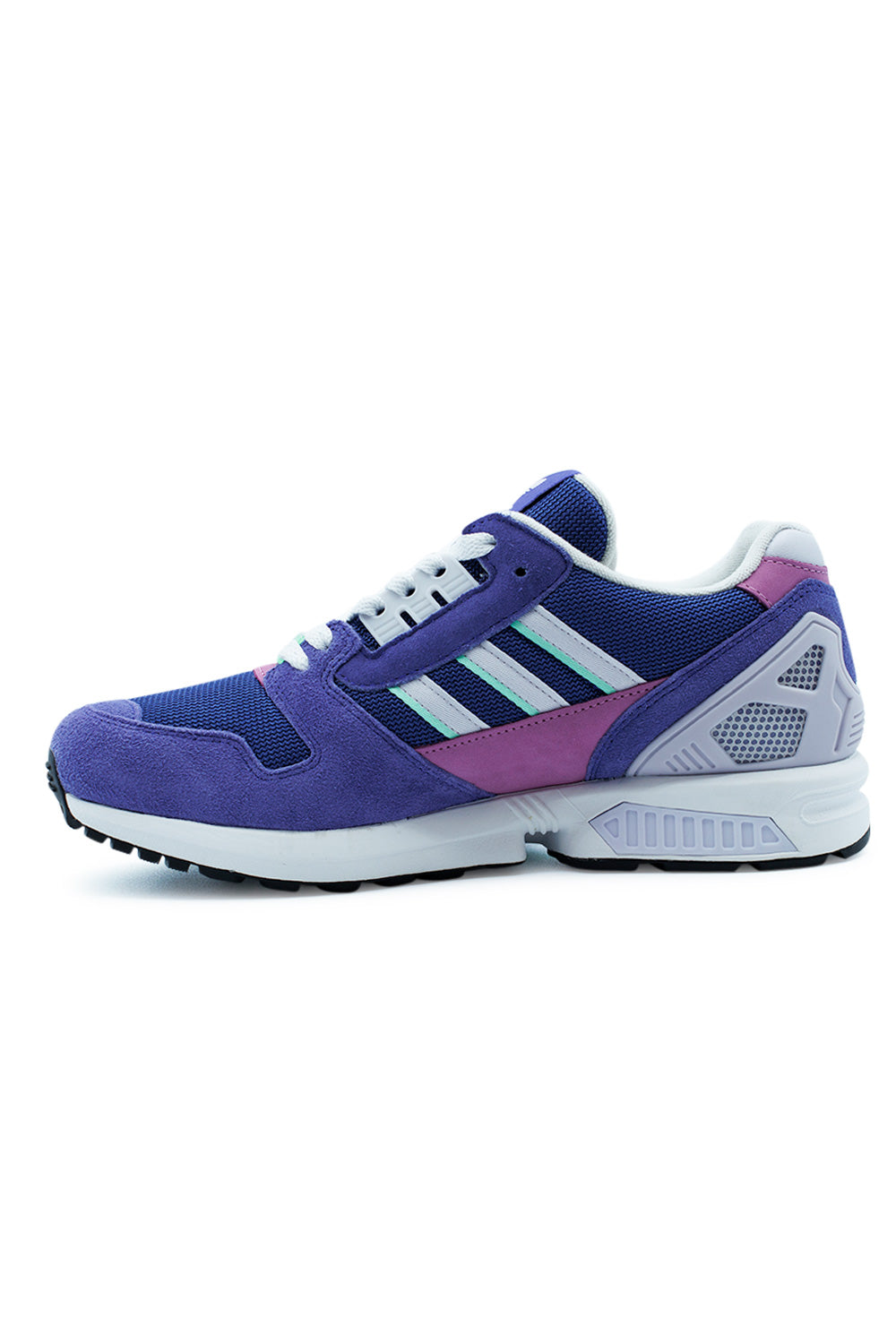 Medial side view of the adidas ZX 8000 sneaker, showcasing the white three stripes with light green borders against the vibrant purple mesh and suede panels.