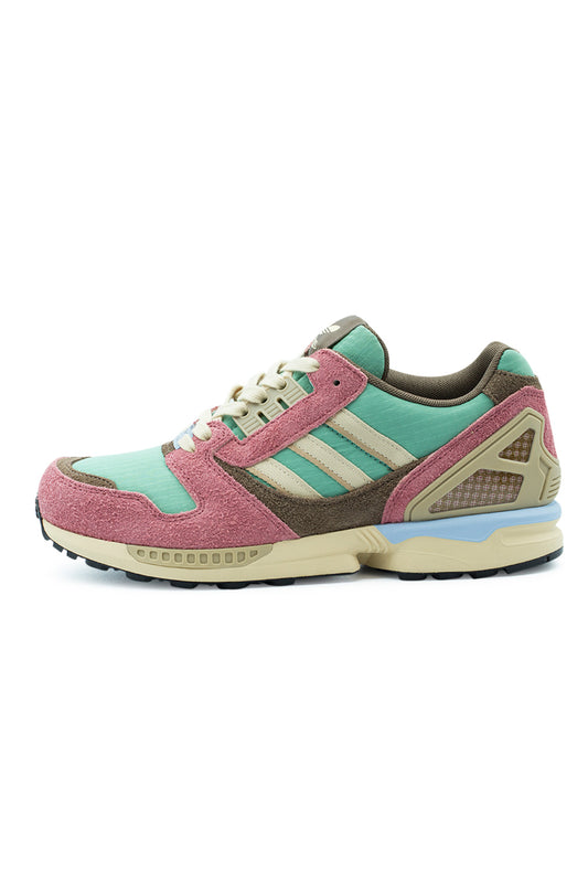 Lateral profile view of the Adidas ZX 8000 sneaker in St Fade Ocean, Sand Strata, and Wonder Red, highlighting the mint green ripstop base, dusty rose hairy suede mudguard, brown suede quarter panel, beige three stripes, olive-tan external TPU heel counter cage, pastel blue heel stabilizer wedge, and cream EVA foam midsole