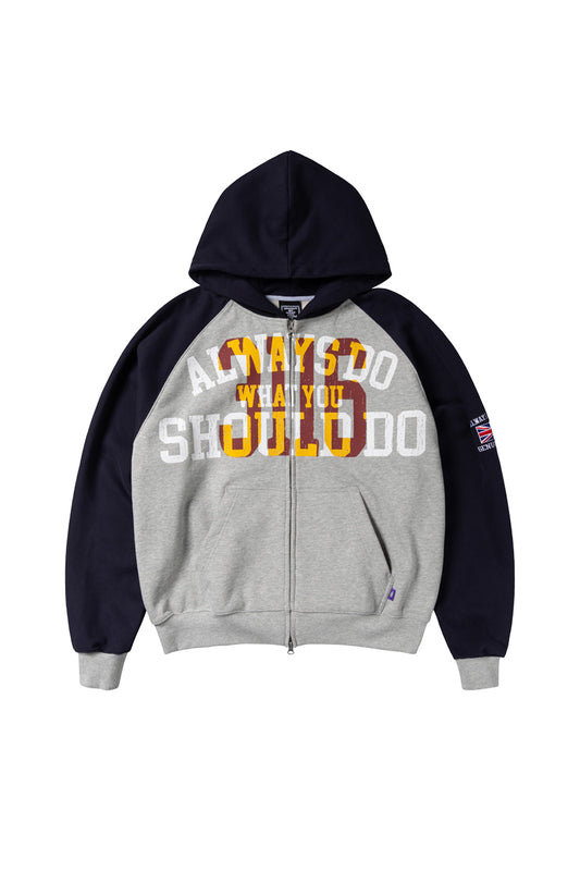 Front view of the Always Do What You Should Do Jersey Raglan Zip Up Hoodie, featuring a heather grey heavy cotton body, dark navy blue raglan sleeves and hood, split kangaroo front pocket, silver two-way YKK front zipper, grey ribbed hem and cuffs, small purple woven label, and a bold white and yellow collegiate "Always Do What You Should Do" distressed chest graphic.
